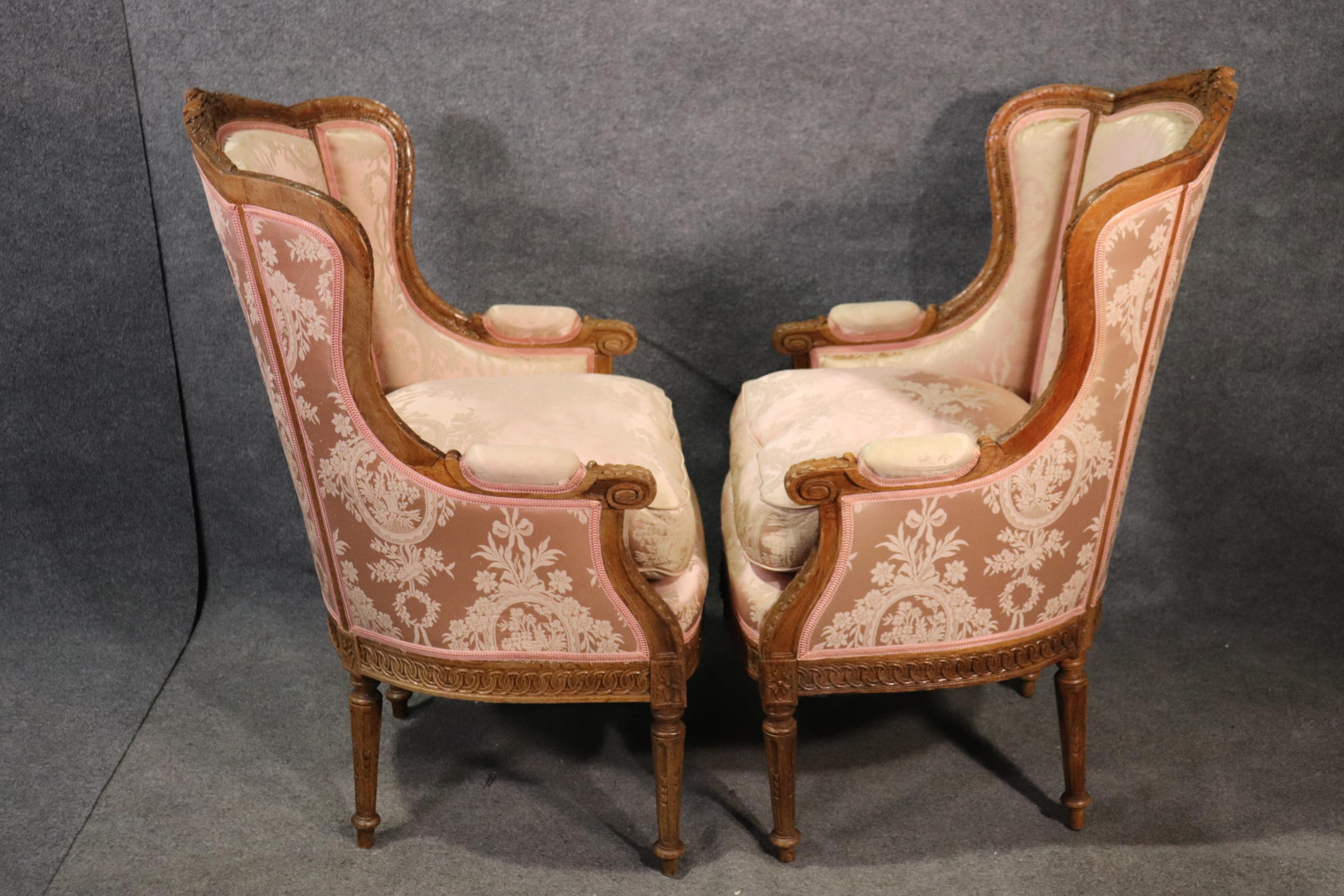 Louis XVI Pair of Finely Carved French Louis XV Oak Wingback Bergère Chairs, circa 1890