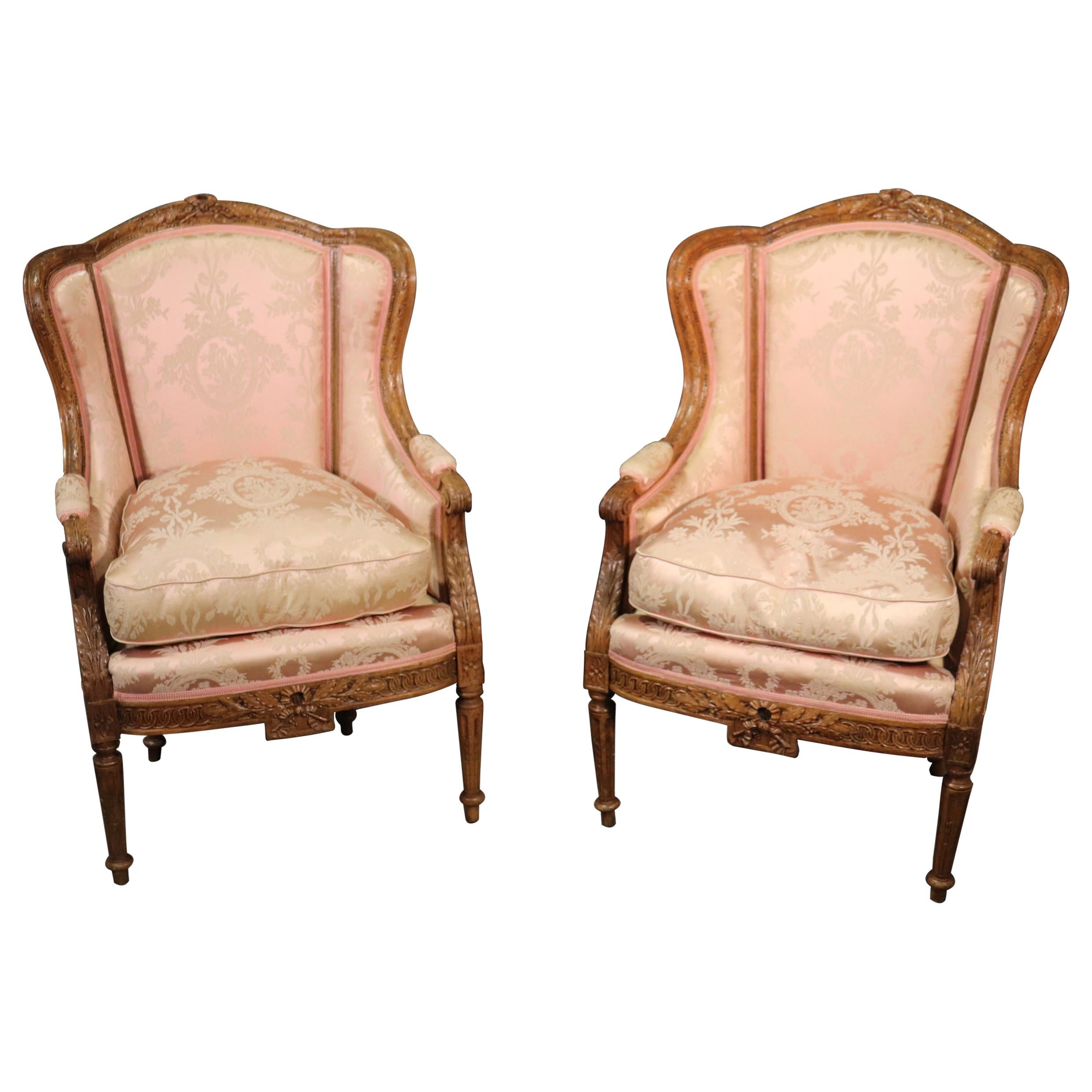 Pair of Finely Carved French Louis XV Oak Wingback Bergère Chairs, circa 1890