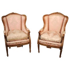 Pair of Finely Carved French Louis XV Oak Wingback Bergère Chairs, circa 1890