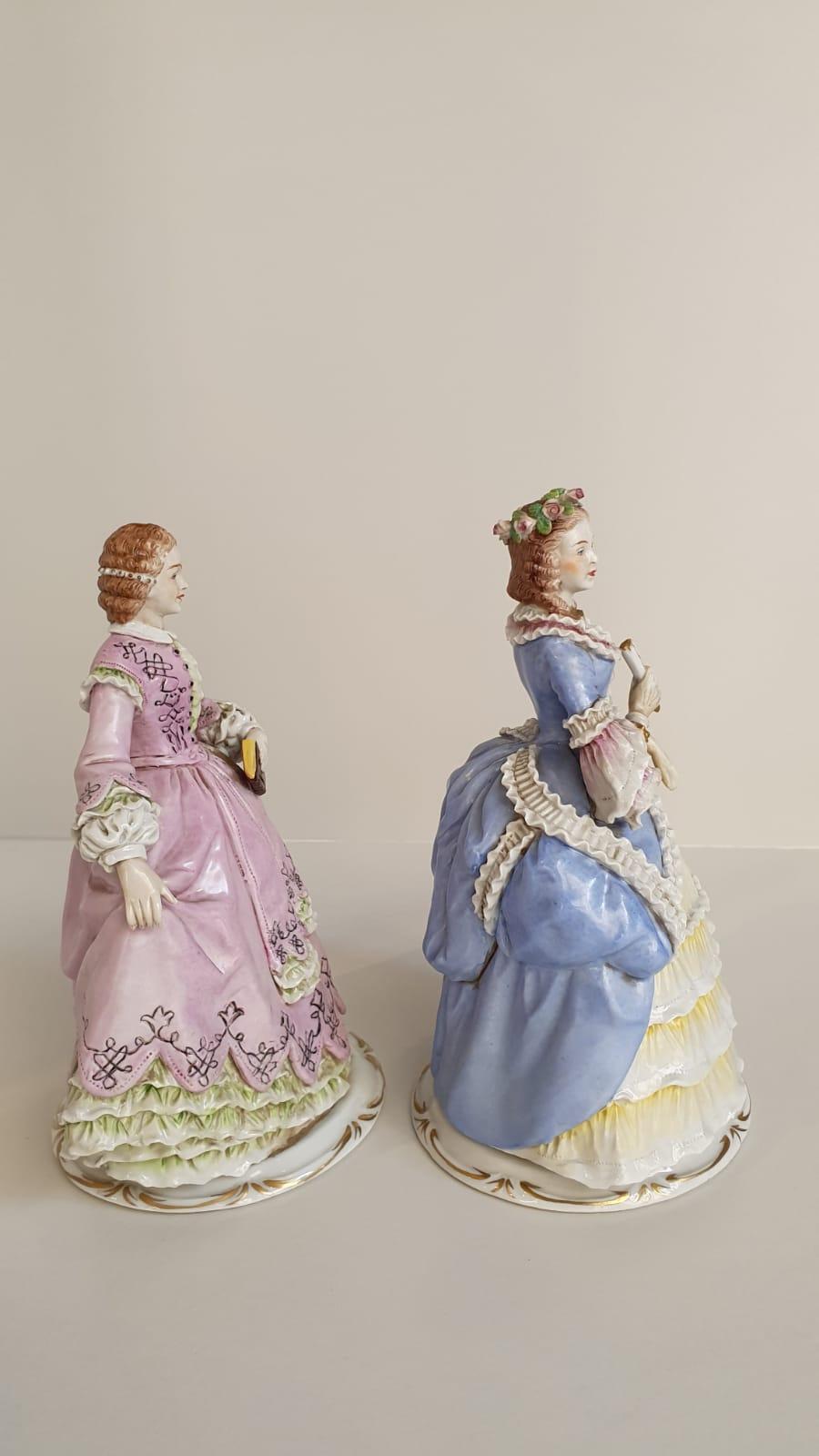 Baroque Pair of antique porcelain ladies made in Sitzendorf (Germany) from the 19th cent For Sale