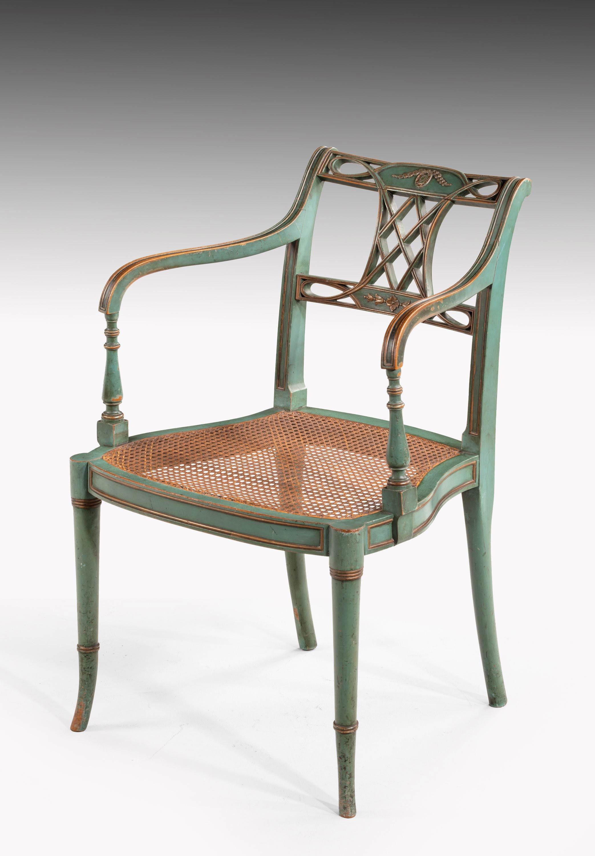 A most attractive and finely drawn pair of Regency period chairs retaining the original green paintwork now very slightly worn on the arms. Overall of elegant design.

Measures: Seat height 17 inches (43cm).
