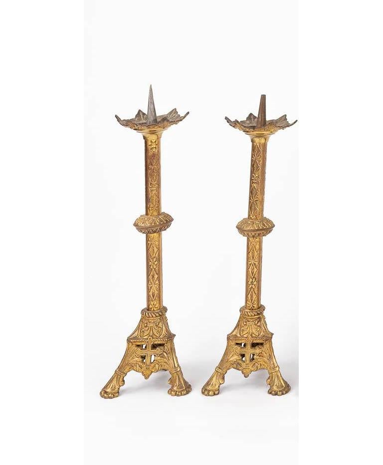 Pair of finely engraved gilt brass European Gothic Revival pricket candlesticks  

Anonymous
Europe; 19th century
Gilt Brass

Approximate size: 17 (h) x 5 (w) x 4.5 (d) in.

This pair of finely engraved and chased cast brass gilded candlesticks