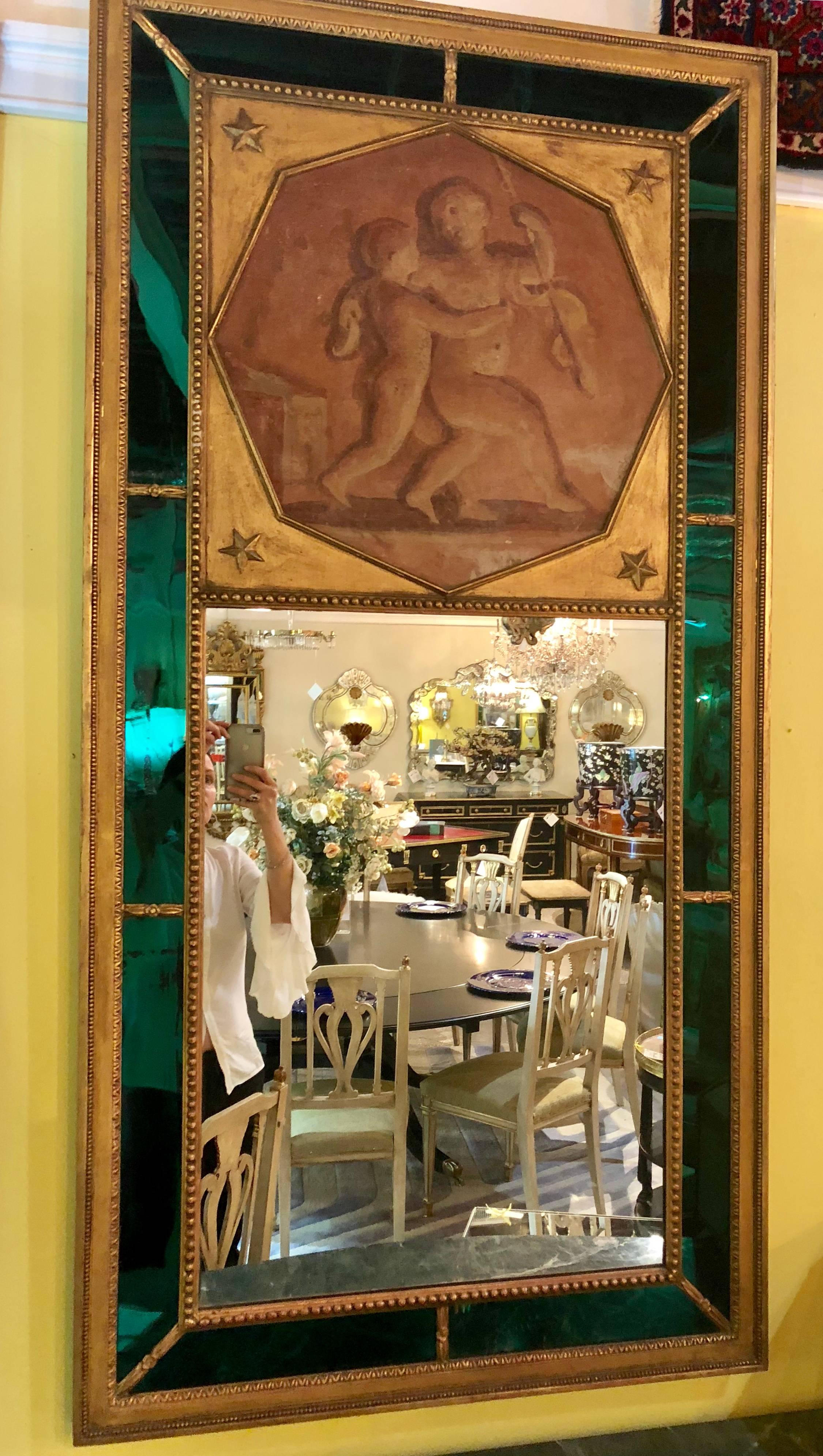 Pair of finest French Directoire style trumeau mirrors, the rectangular frame banded with green colored-glass, each decorated with painted cherubs, Jansen.