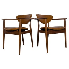 Paar von  Finn Juhl '109' Sessel aus Teakholz, cognacfarbenem Leder und Messing, 1946