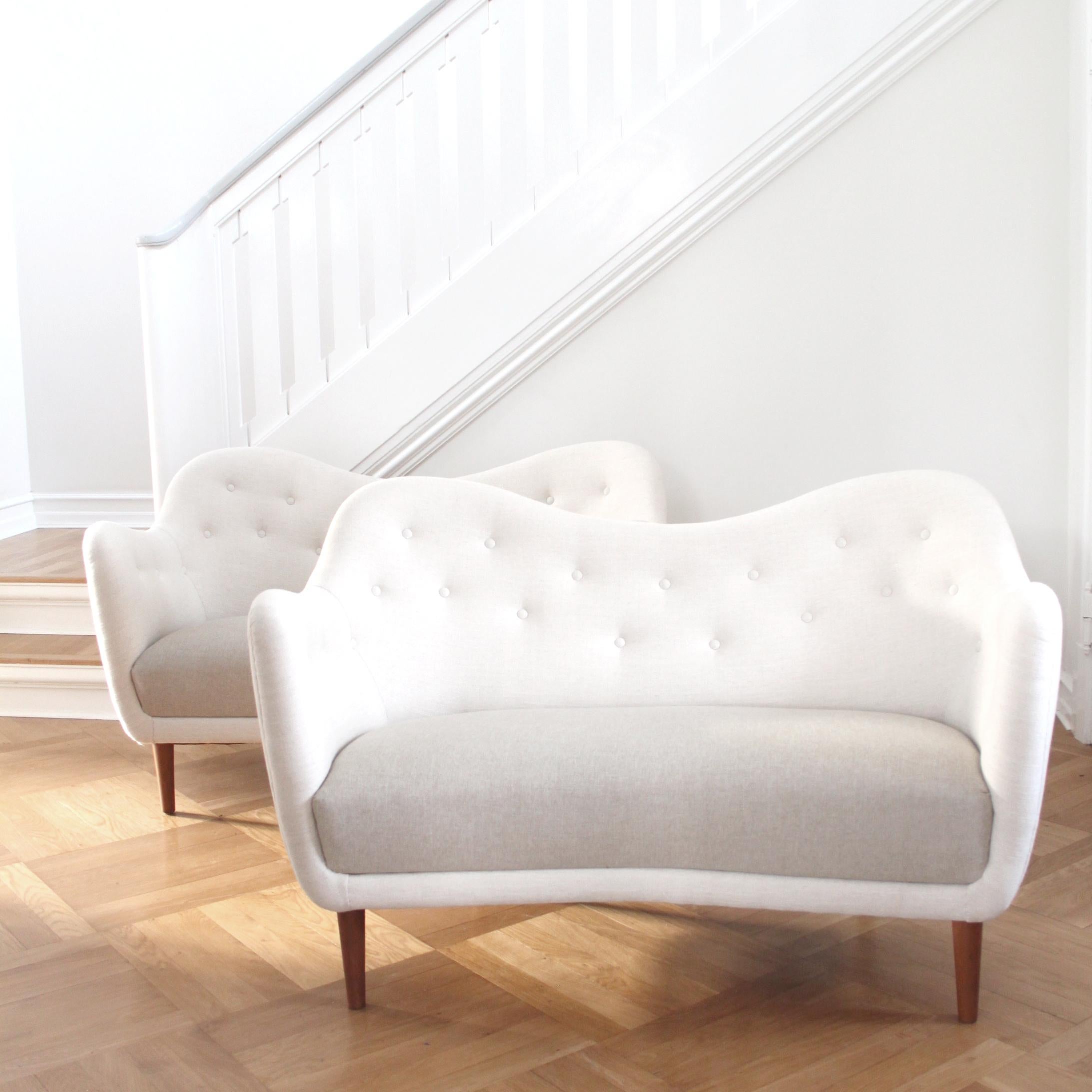 FINN JUHL BY CARL BRØRUP FOR BOVIRKE, SCANDINAVIAN MODERN

An beautiful pair of Finn Juhl two-seat BO46 sofas, designed in 1946, manufactured by Carl Brørup for Bovirke, Copenhagen, Denmark.

The sofas have been completely restored and