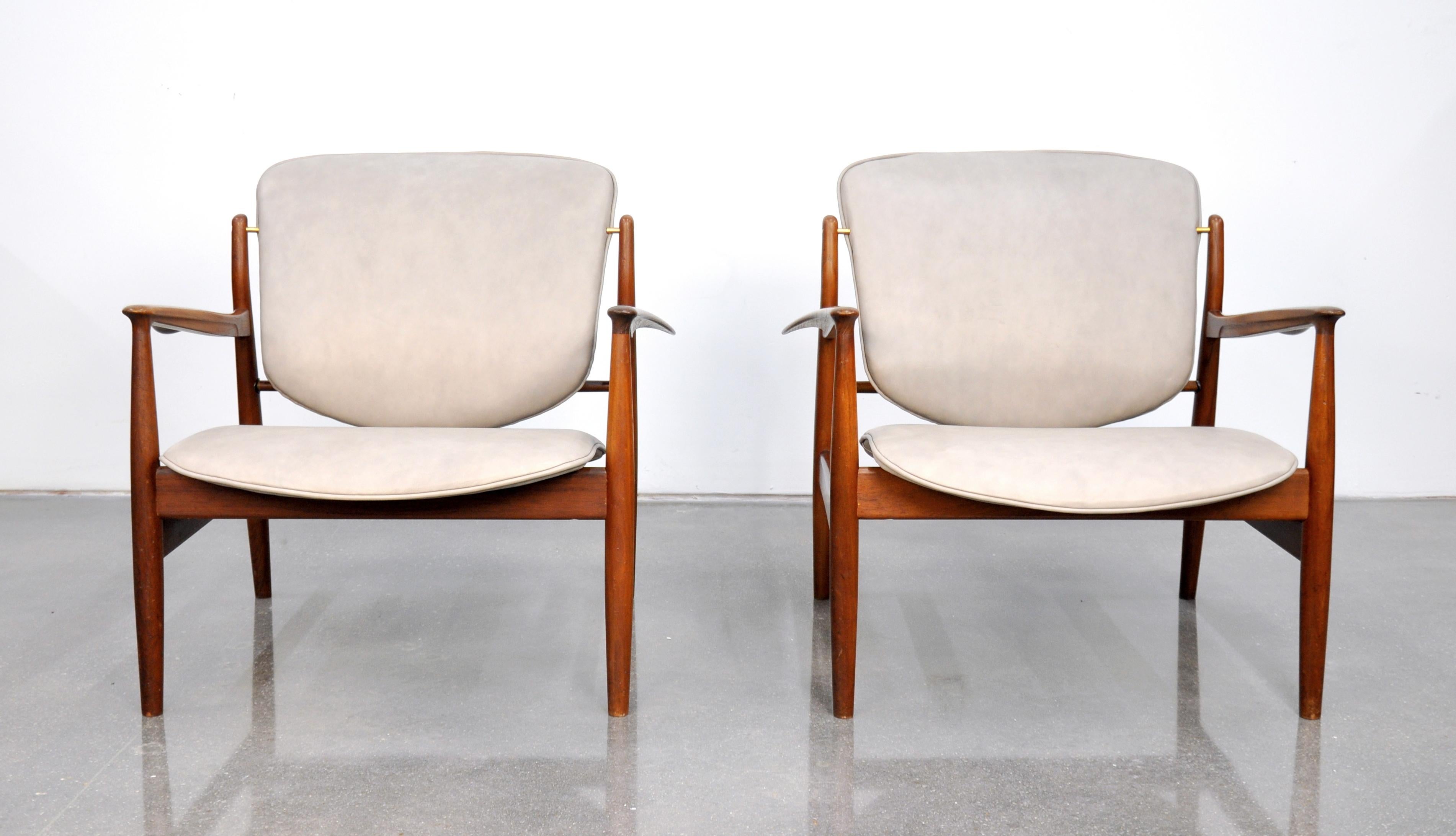 Brass Pair of Finn Juhl FD 136 Teak and Grey Leather Lounge Chairs
