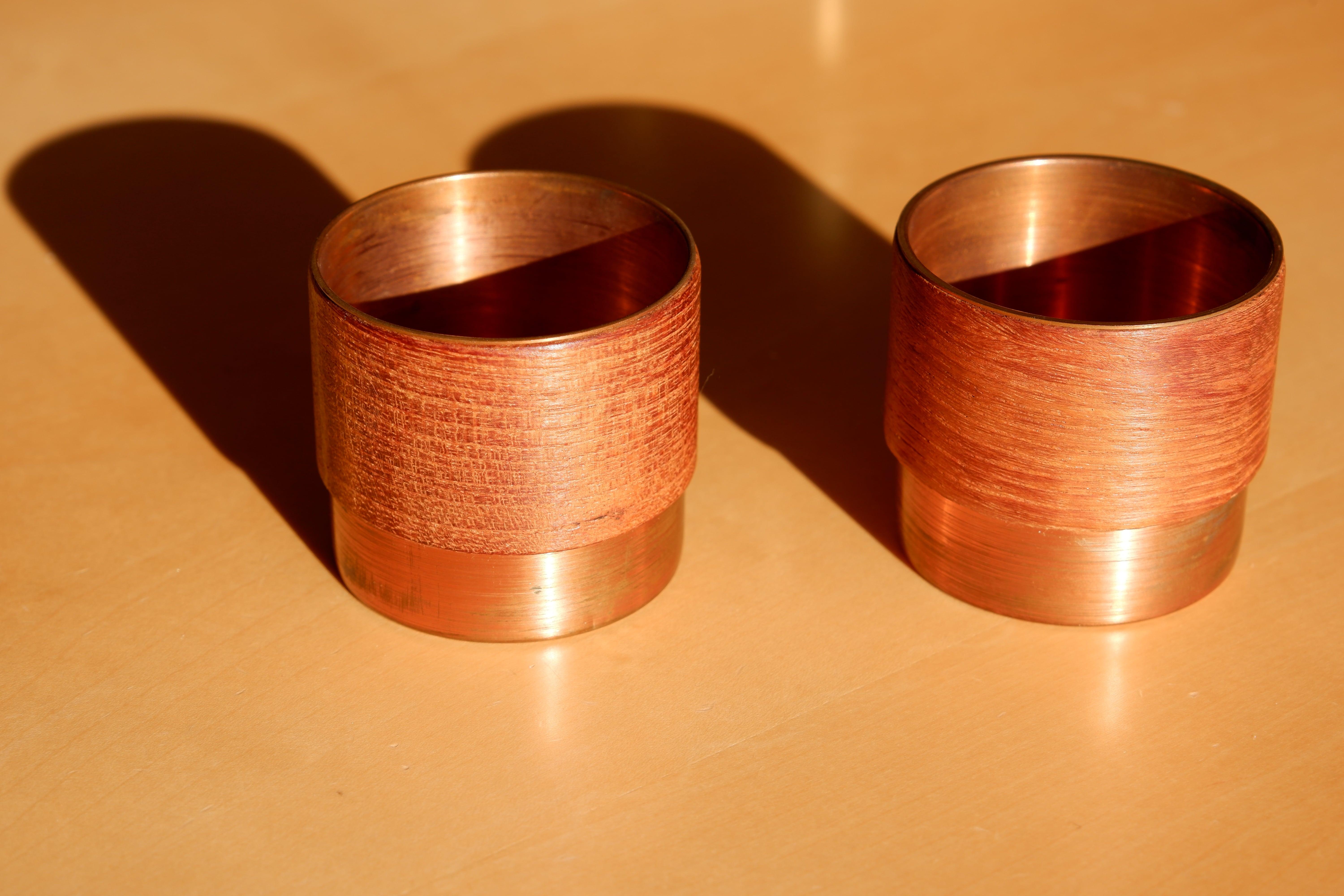 Mid-20th Century Pair of Finnish Bowls in Copper and Teak in the Style of Paavo Tynell, 60's For Sale