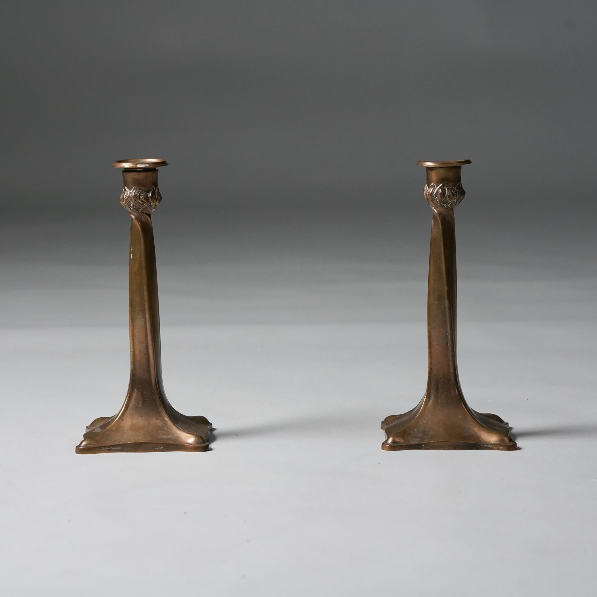 Pair of Finnish brass candlesticks, 1930/1940s. Good vintage condition, patina consistent with age and use. 