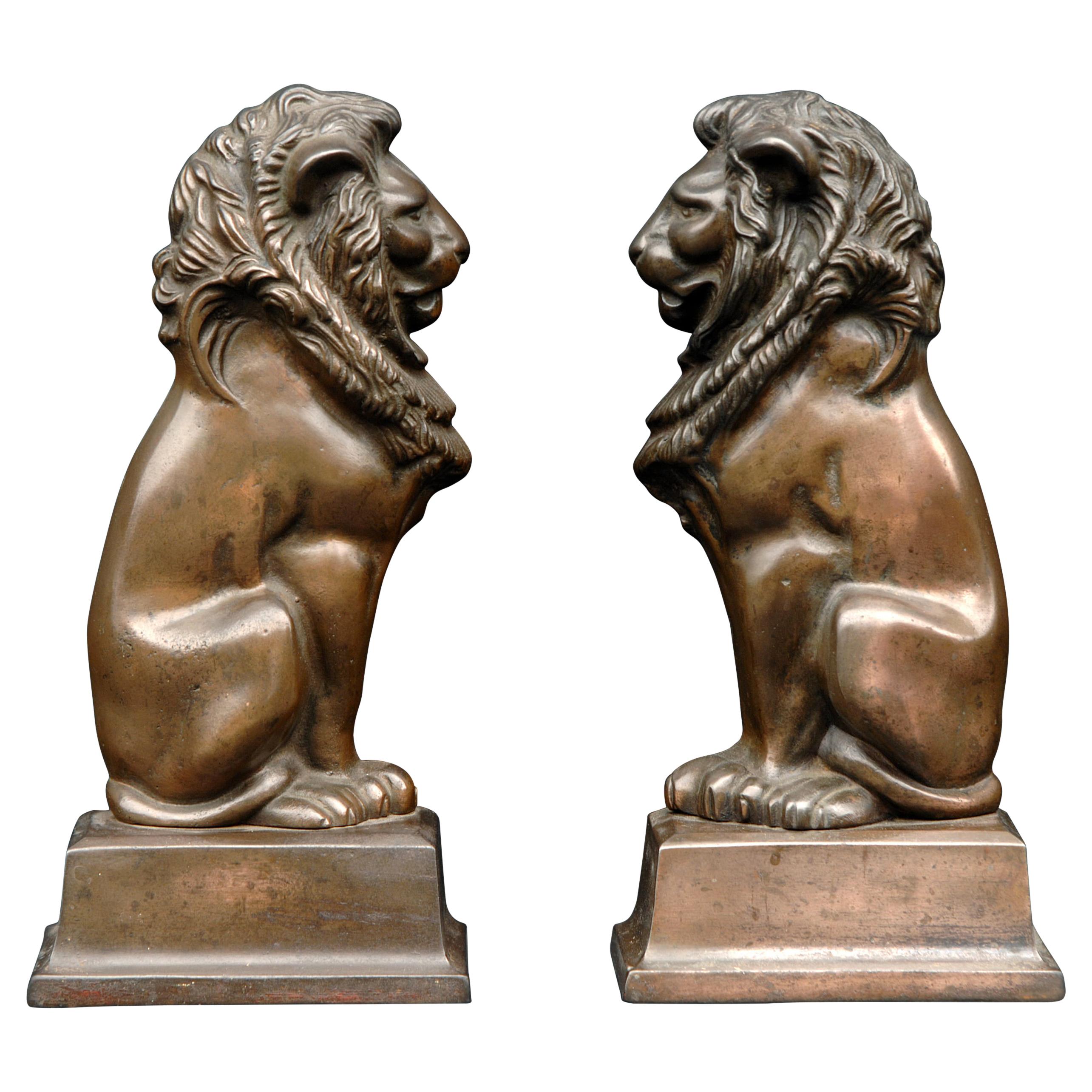 Pair of Firedogs with Lion Motif