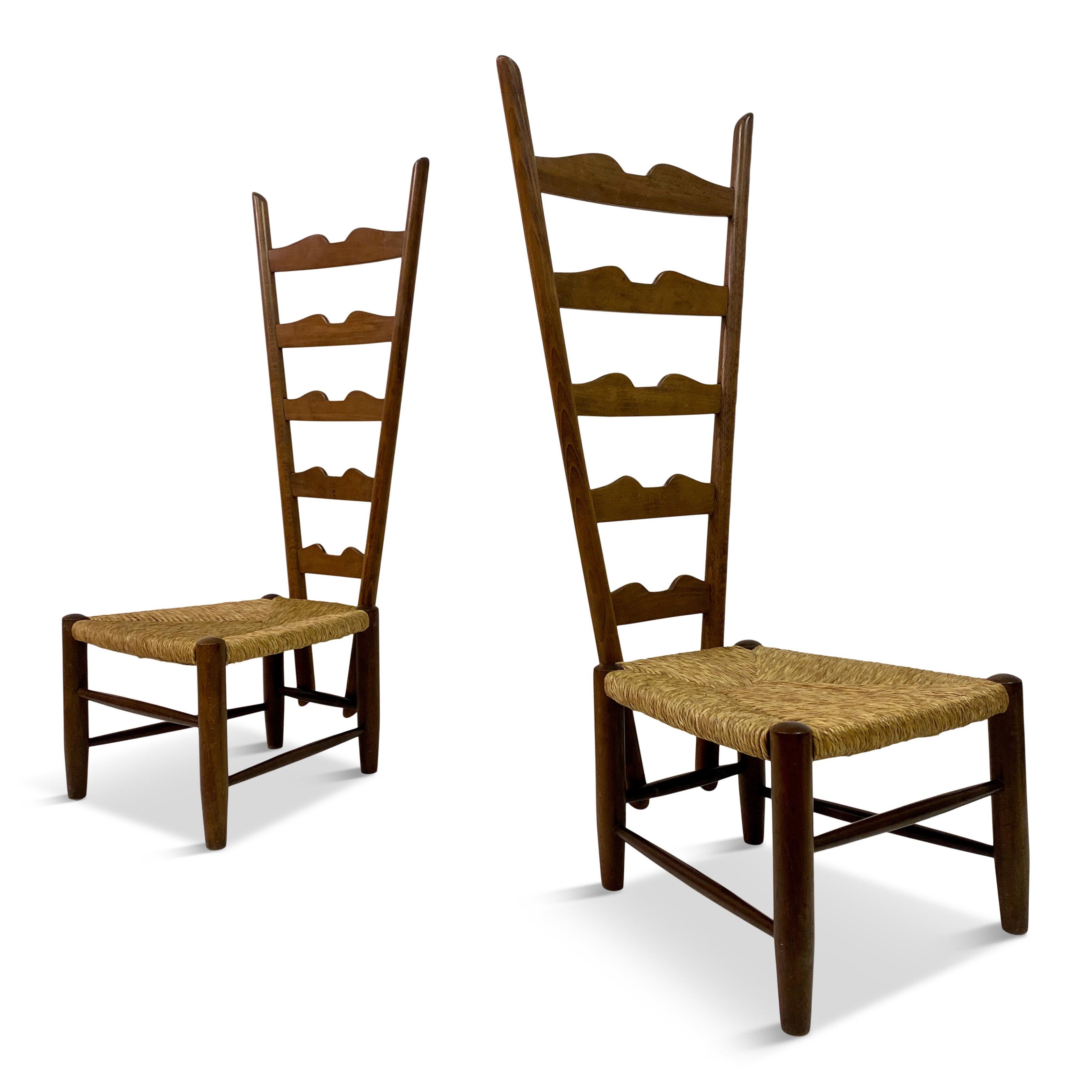 Pair of fireside chairs

By Gio Ponti

For Casa e Giardino

Rush seats

High backs

Seat height 30cm

Italy Mid 20th century.