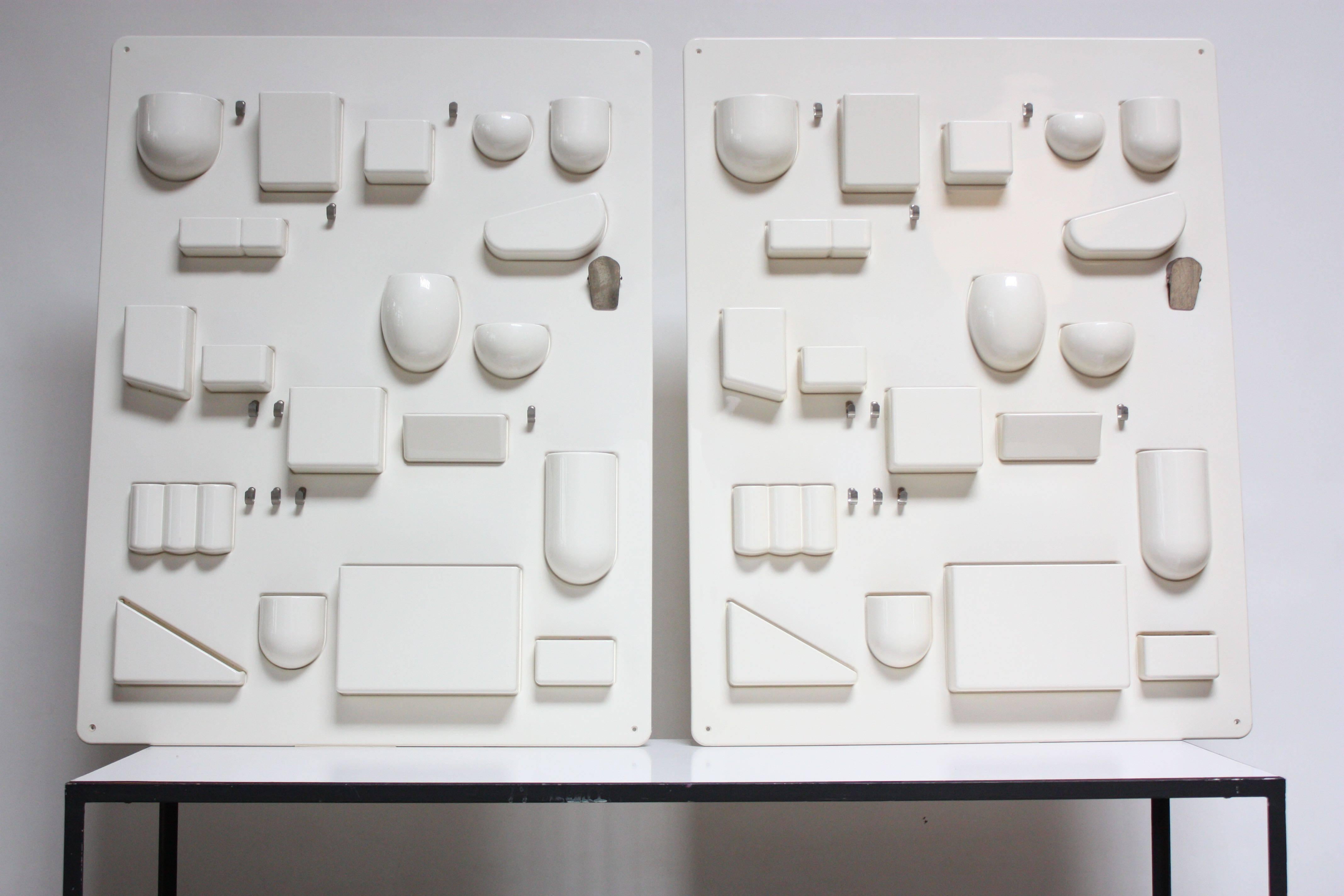 Pair of molded plastic Uten.Silos / Wall-Alls designed by Dorothee Maurer-Becker for Design M. These early examples in white (circa 1969, Germany) measure 34.25