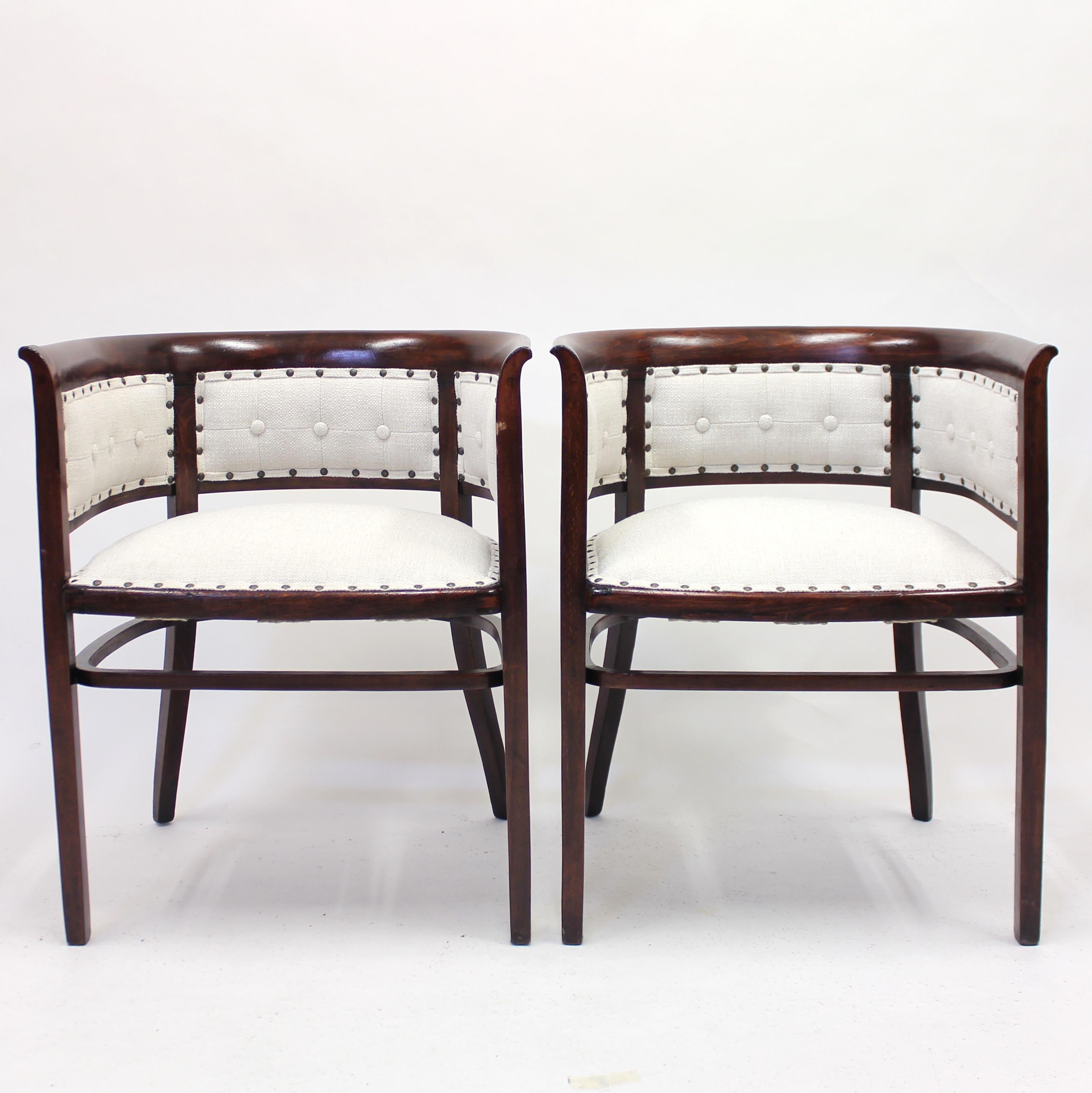 Rare pair of Fischel bentwood armchair in stained birch with newly upholstered seat and back in a white wool fabric. They are very much in the style of both Josef Hoffmann (who worked for both Thonet and Kohn) and Marcel Kammerer (who worked for