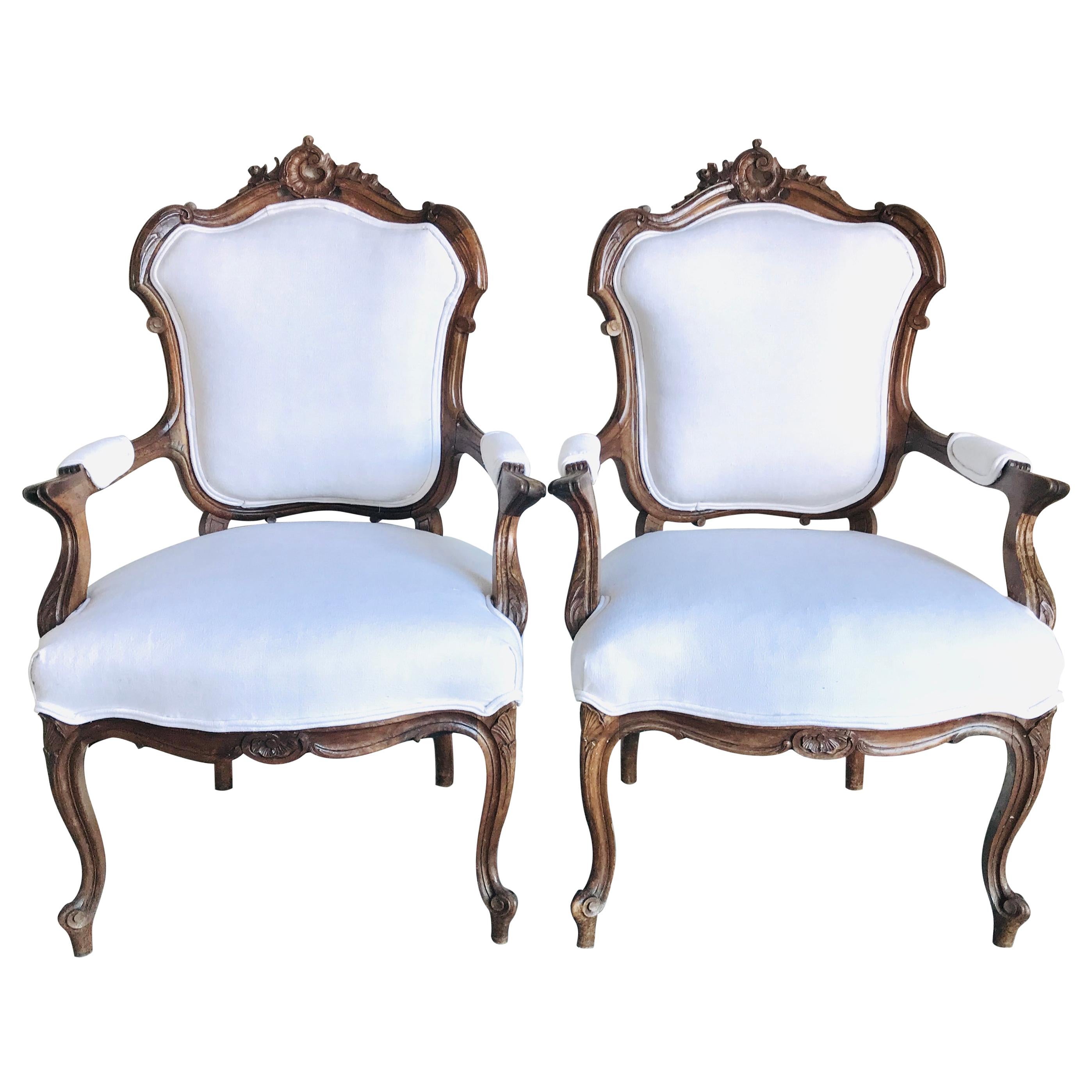 Pair of Fit for Royalty French Louis XV Carved Walnut Fauteuil Armchairs