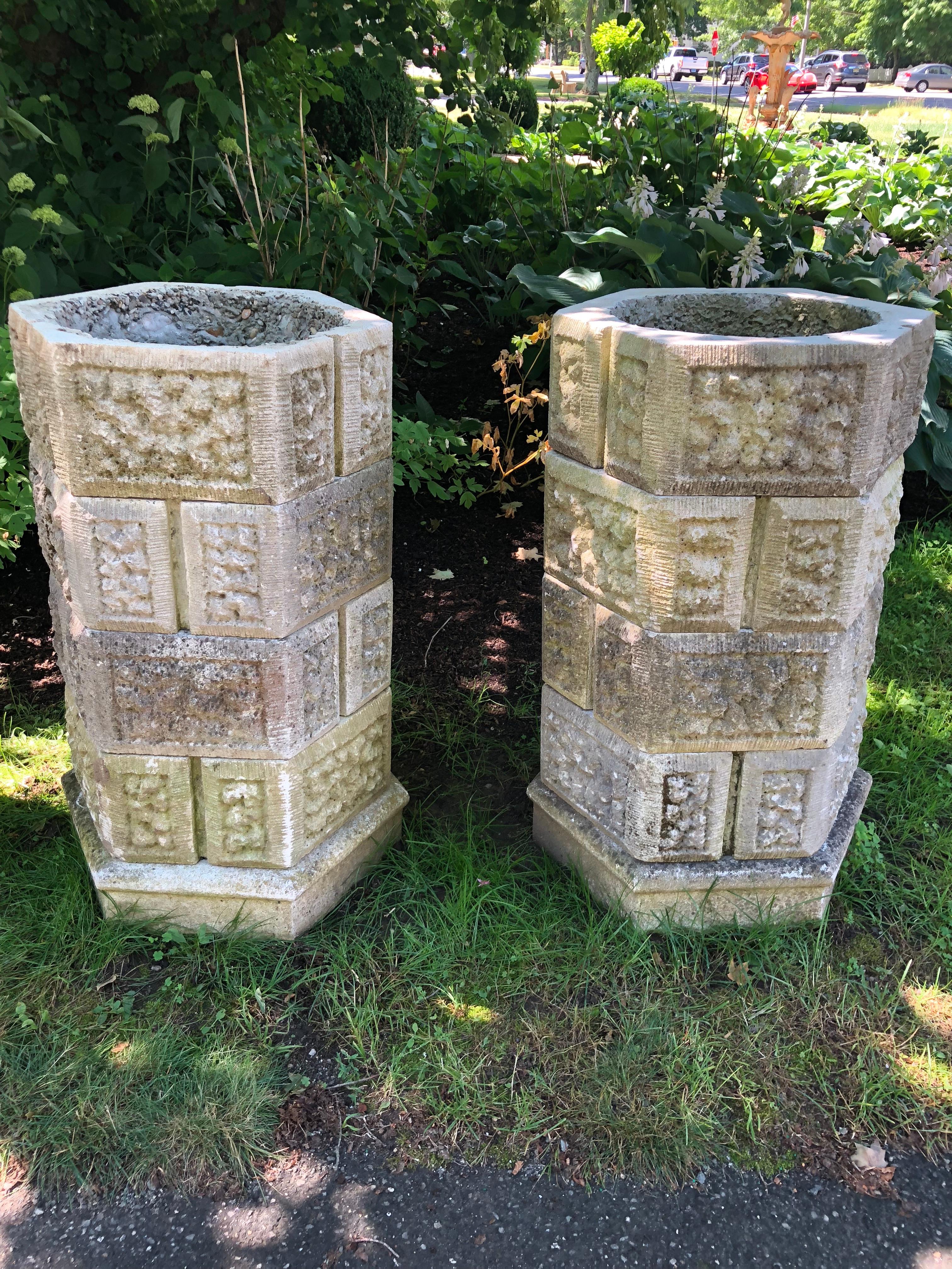 This pair of stackable cast stone planters has five tiers so you can use all five or remove one or two to achieve your desired height. Unusual in form and style, they would be the perfect accompaniment to a Tudor or Gothic Revival home or garden.
