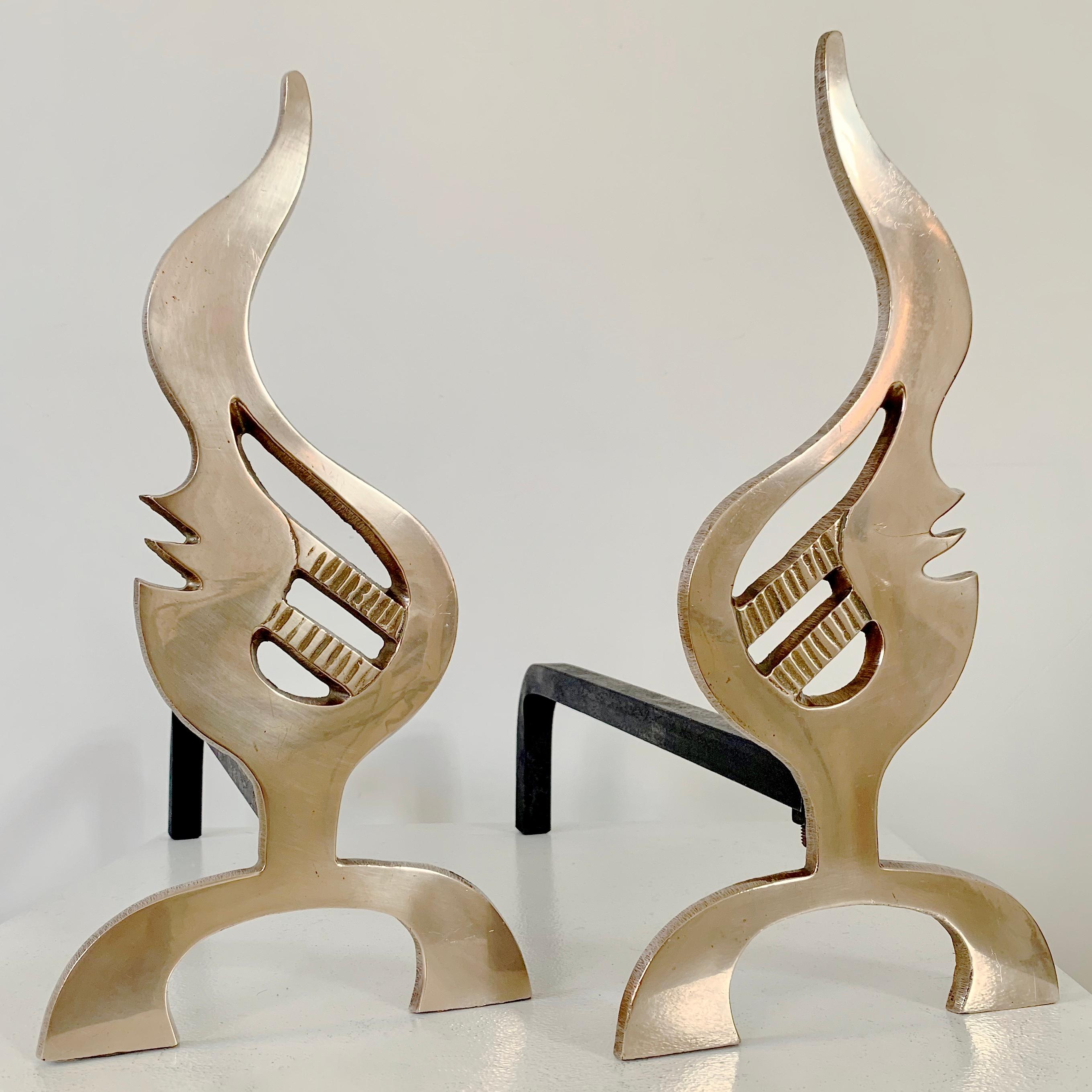Very nice pair of stylised flame andirons, circa 1960, France.
Polished brass, wrought iron.
Dimensions: 43 cm D, 38 cm H, 18 cm W.
All purchases are covered by our Buyer Protection Guarantee.
This item can be returned within 7 days of