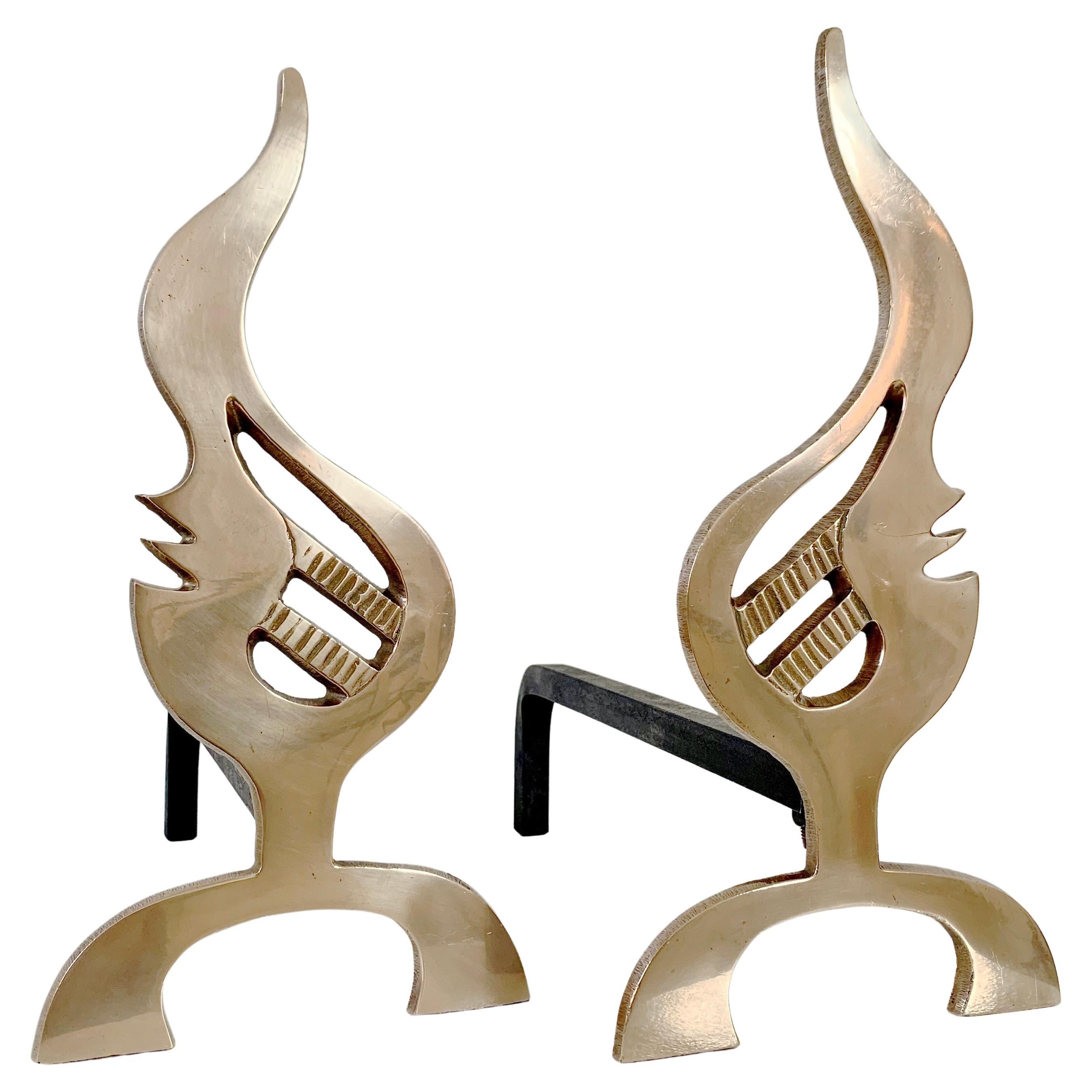 Very nice pair of stylised flame andirons, circa 1960, France.
Polished brass, wrought iron.
Dimensions: 43 cm D, 38 cm H, 18 cm W.
All purchases are covered by our Buyer Protection Guarantee.
This item can be returned within 7 days of