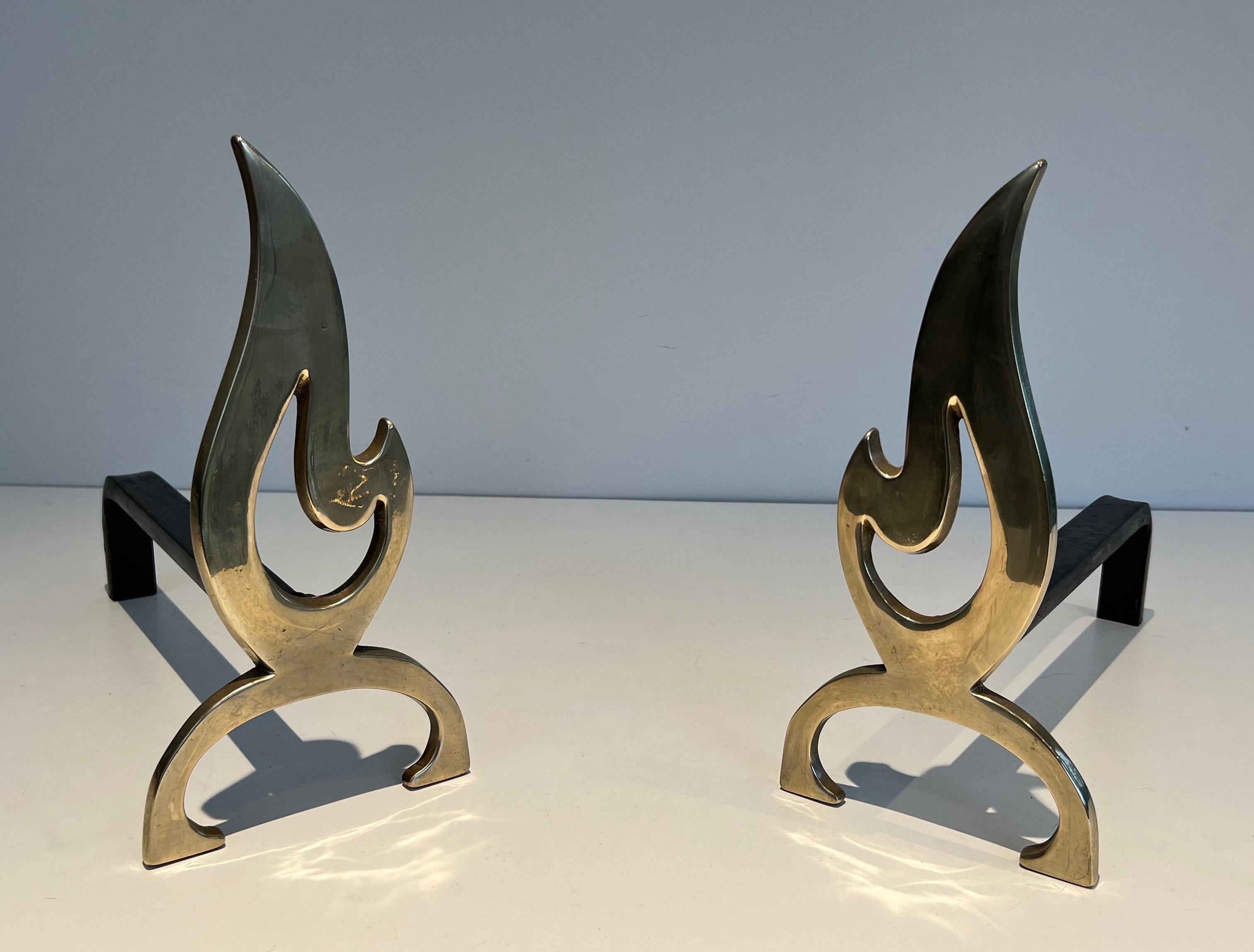 Mid-Century Modern Pair of Flame Brass Andirons For Sale