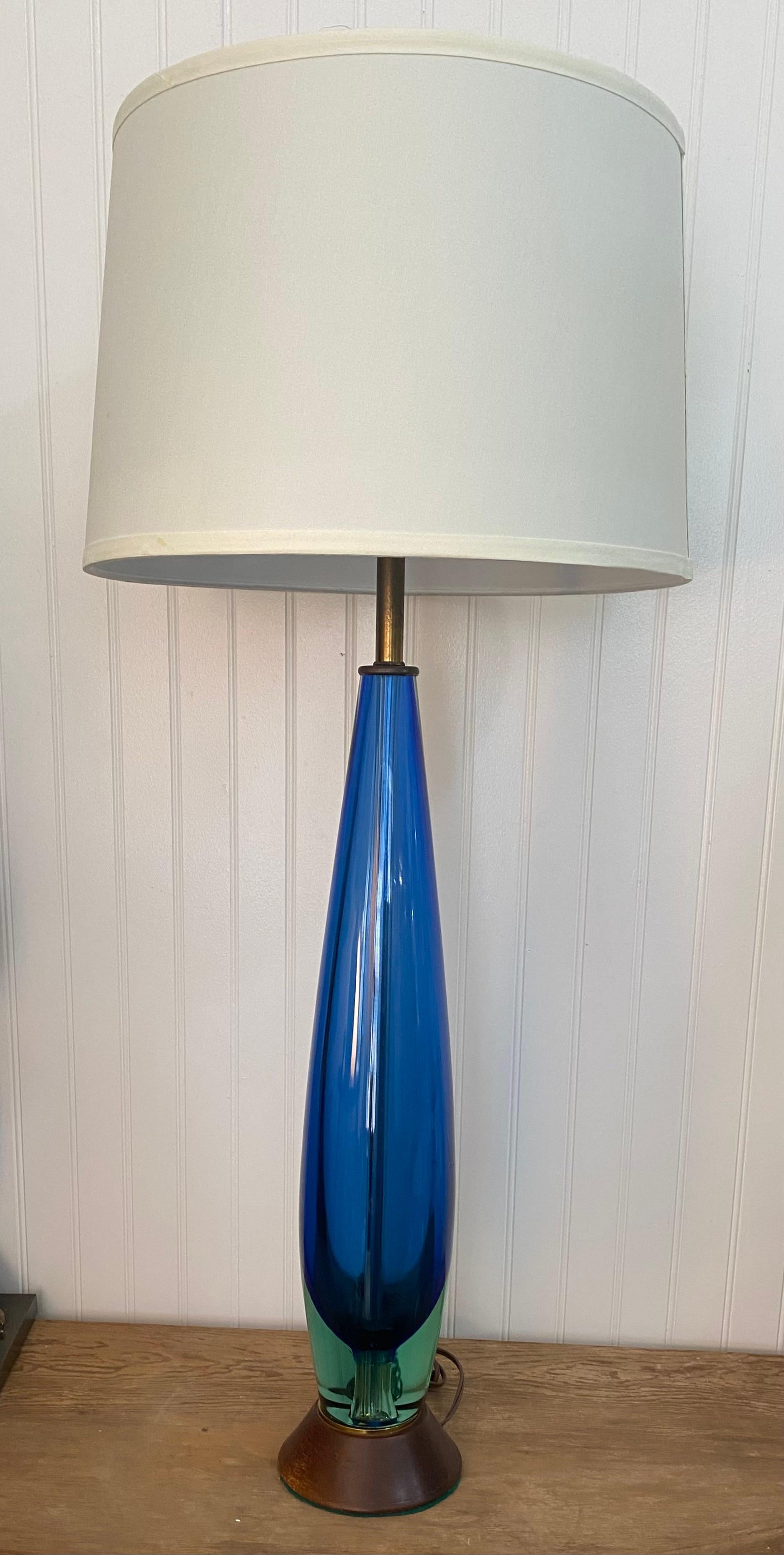 A fantastic pair of bulbous shaped table lamps designed by Flavio Poli and made by Seguso, Murano. Beautiful sommerso technique with green - blue - clear layers of glass. 

Height to top of glass is 24 inches plus 6.5 inches to top of bulb