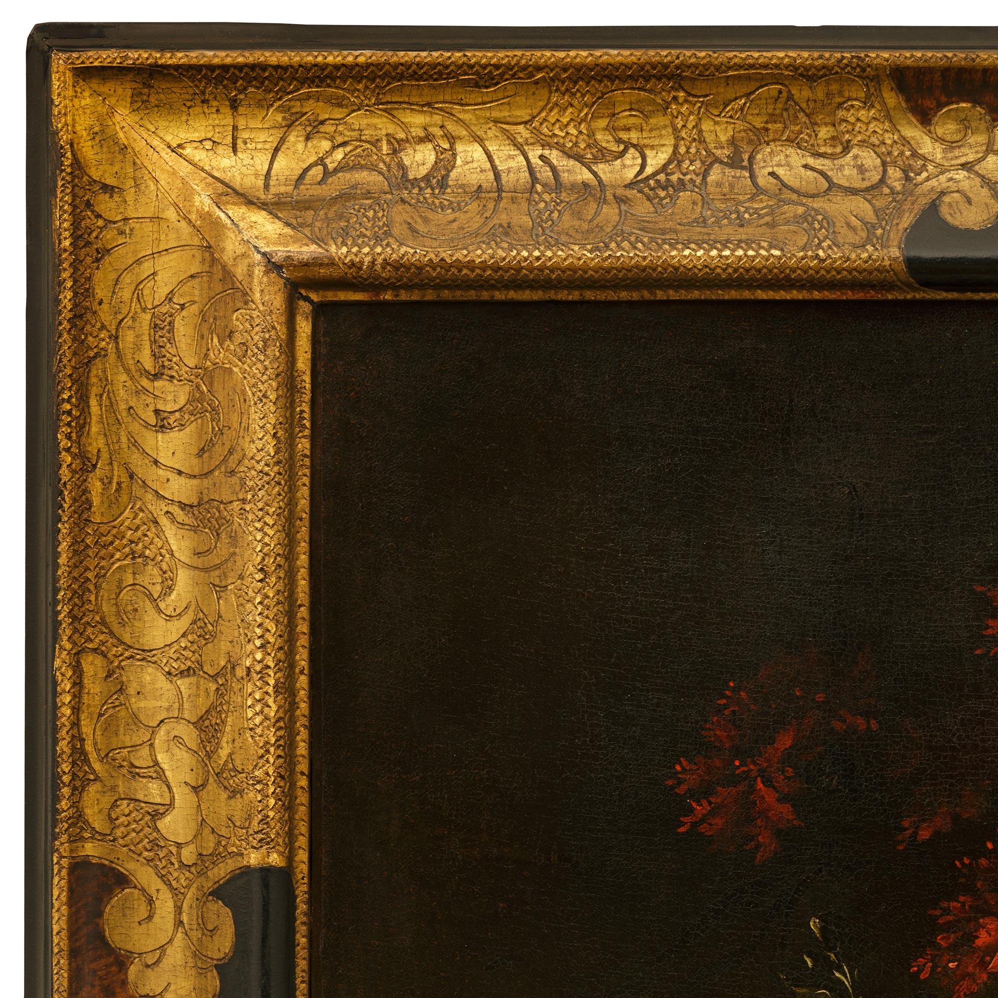 Paire de peintures flamandes du 17e siècle à l'huile sur toile et bois doré Bon état - En vente à West Palm Beach, FL