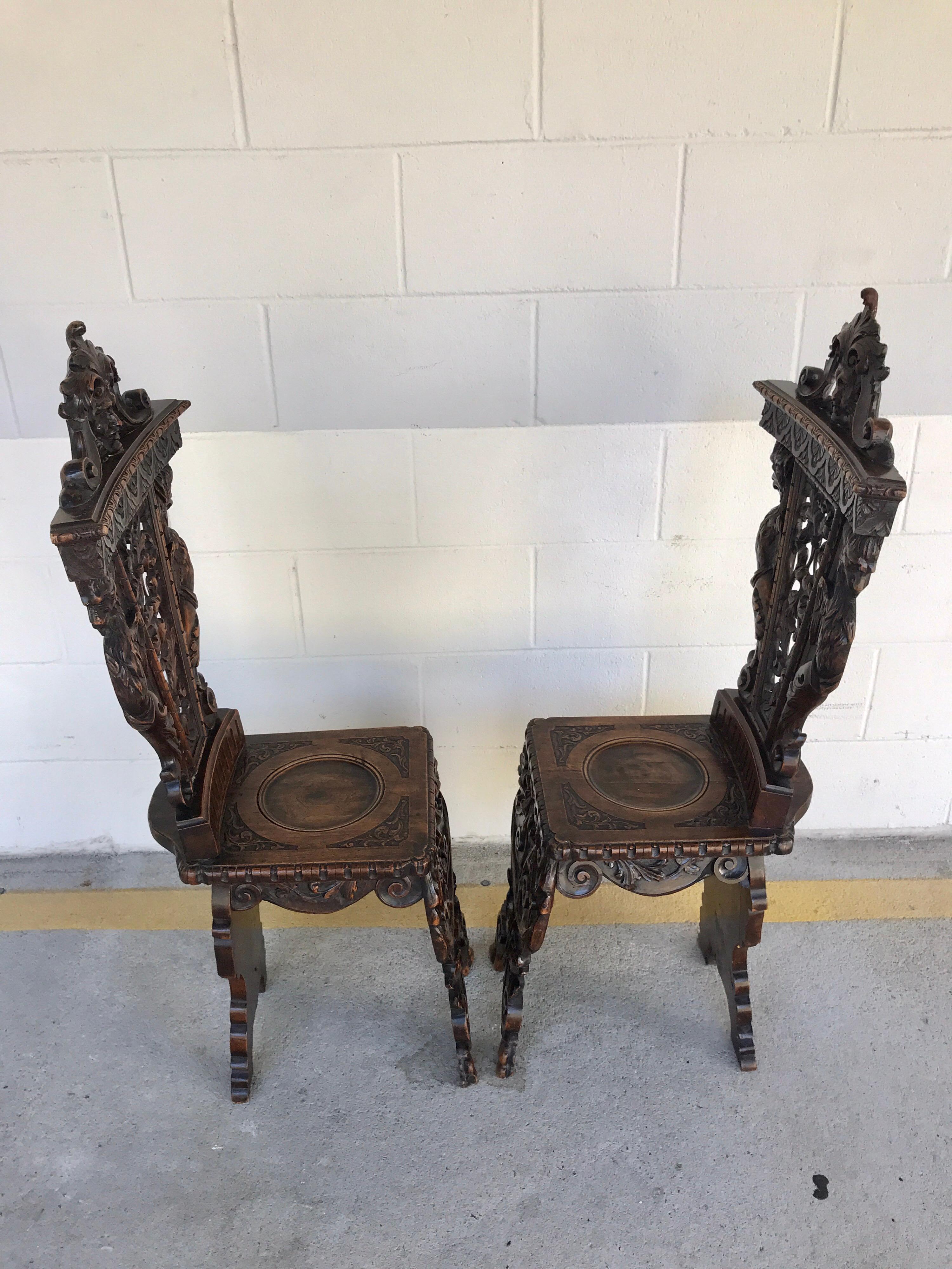 20th Century Pair of Flemish Carved Walnut Fireside Chairs