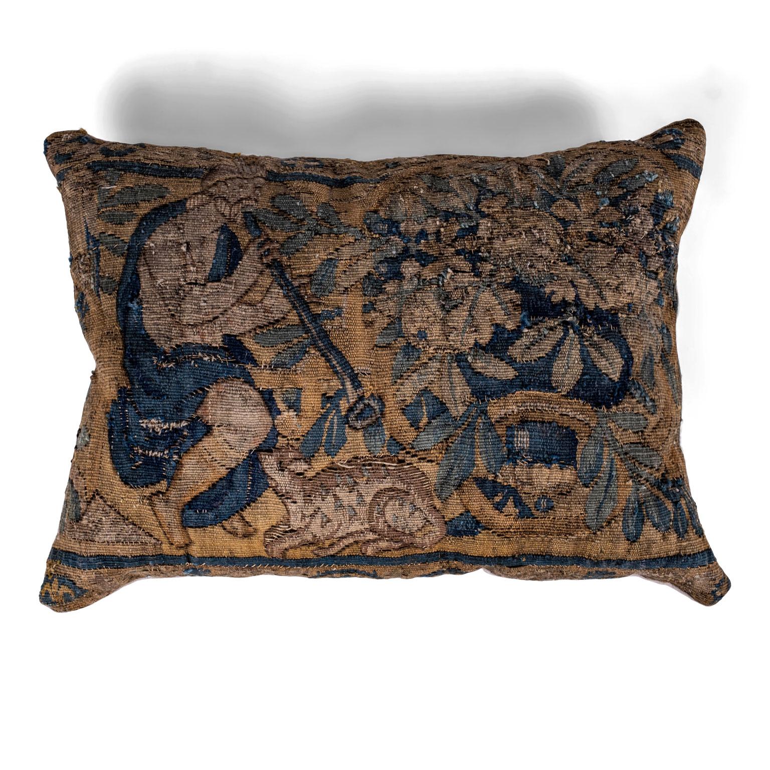 Pair of Flemish tapestry cushions. Two decorative cushions made with fragments of a 17th century Flemish tapestry. Sold individually and priced $1,200 each.