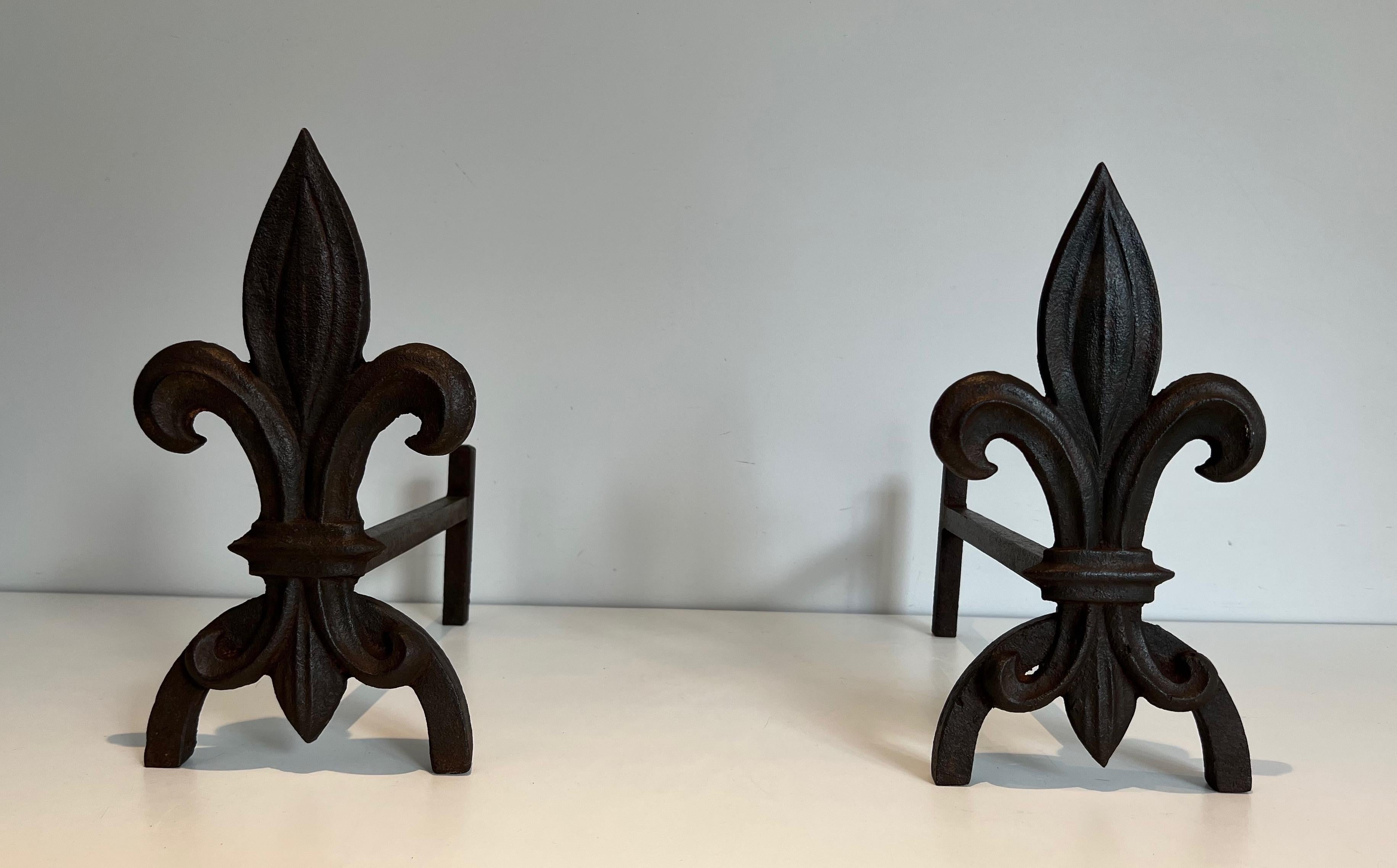 Mid-Century Modern Pair of Fleurs de Lys Cast Iron and Wrought Iron Andirons For Sale