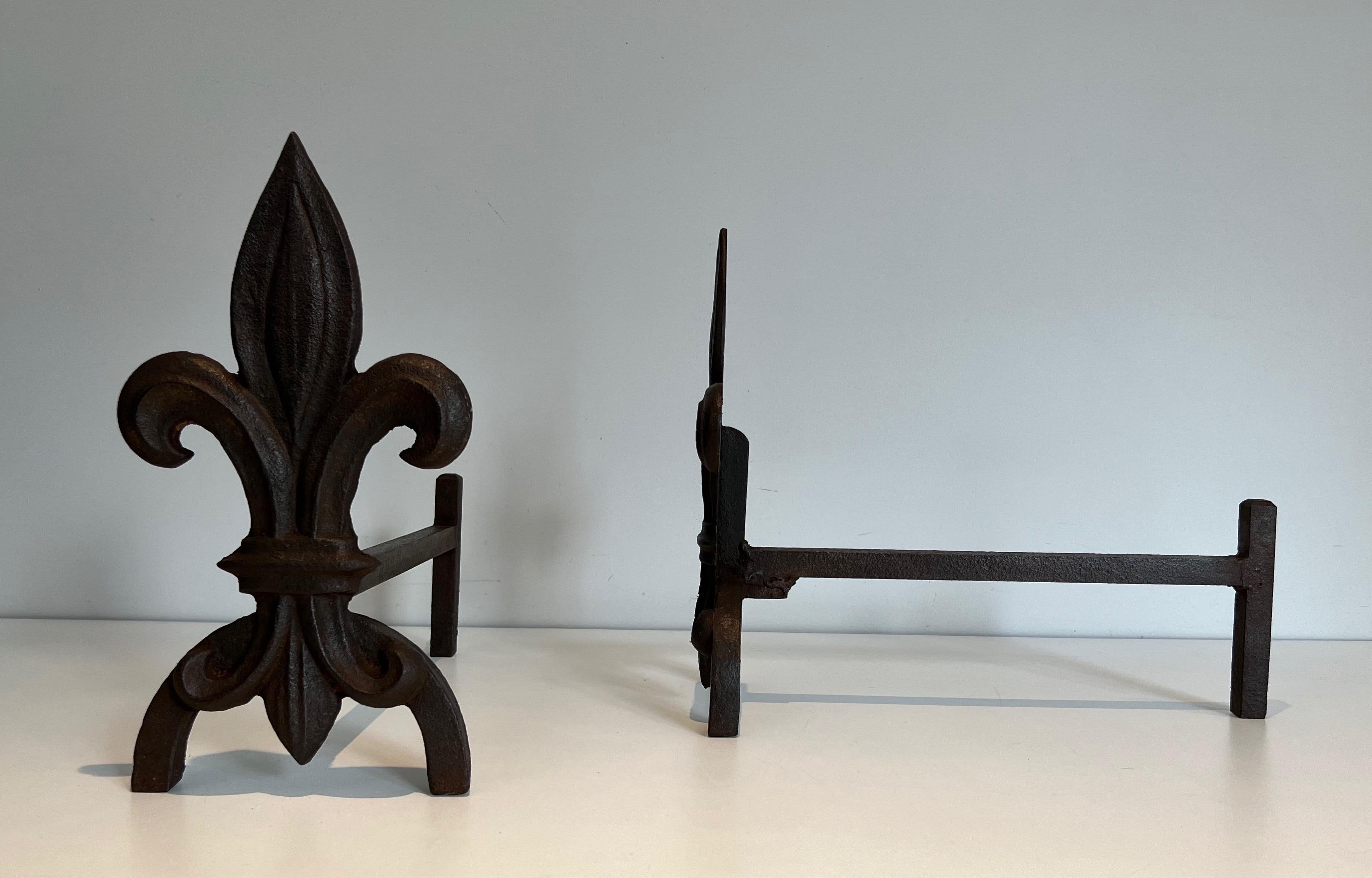 Late 20th Century Pair of Fleurs de Lys Cast Iron and Wrought Iron Andirons For Sale