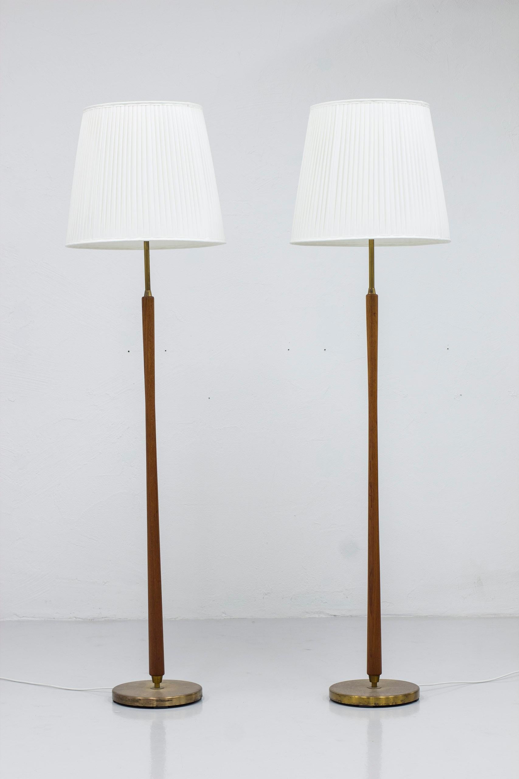 Scandinavian Modern Pair of floor lamps attributed to Hans Bergström, by ASEA belysning. 1950s For Sale