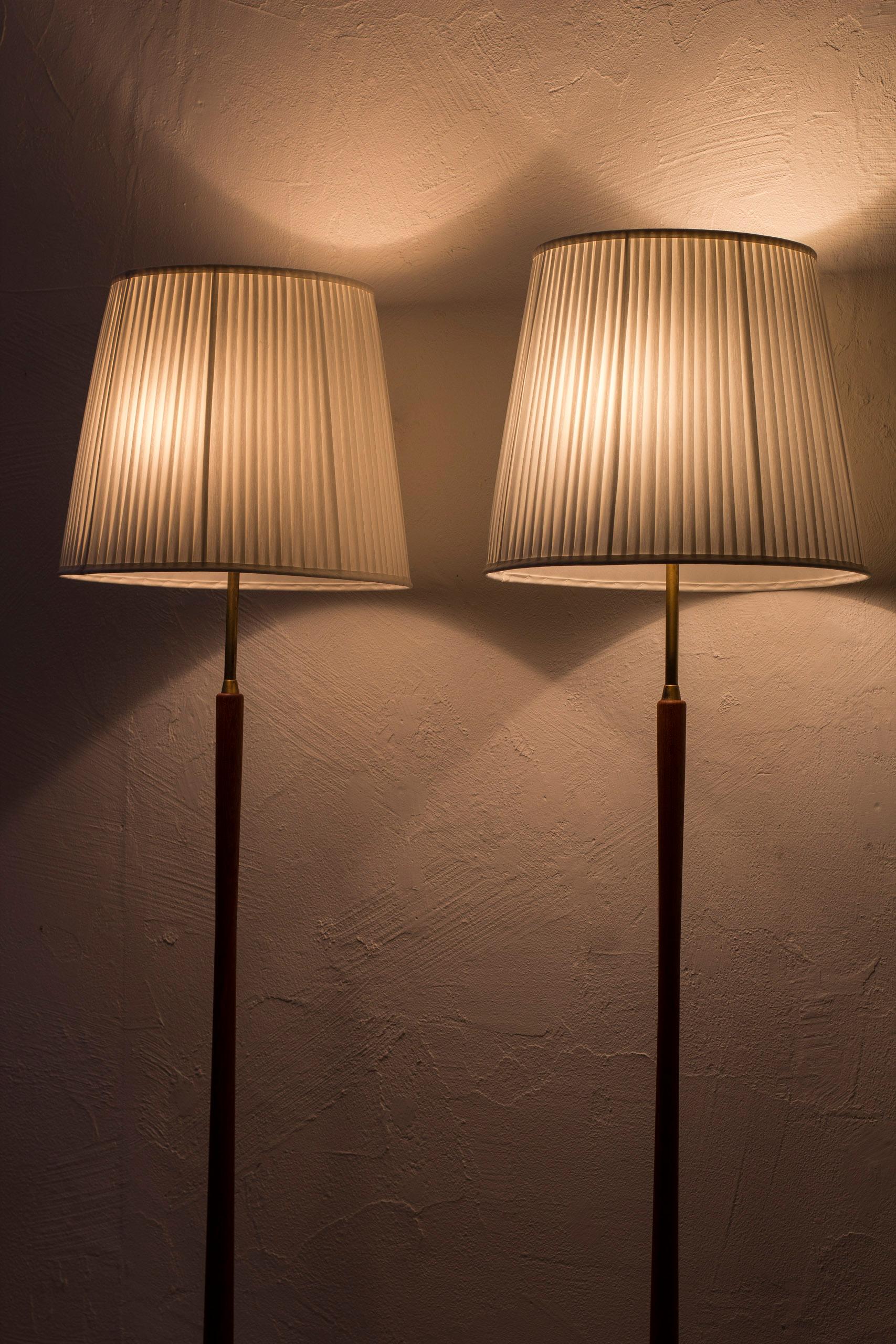 Aluminum Pair of floor lamps attributed to Hans Bergström, by ASEA belysning. 1950s For Sale