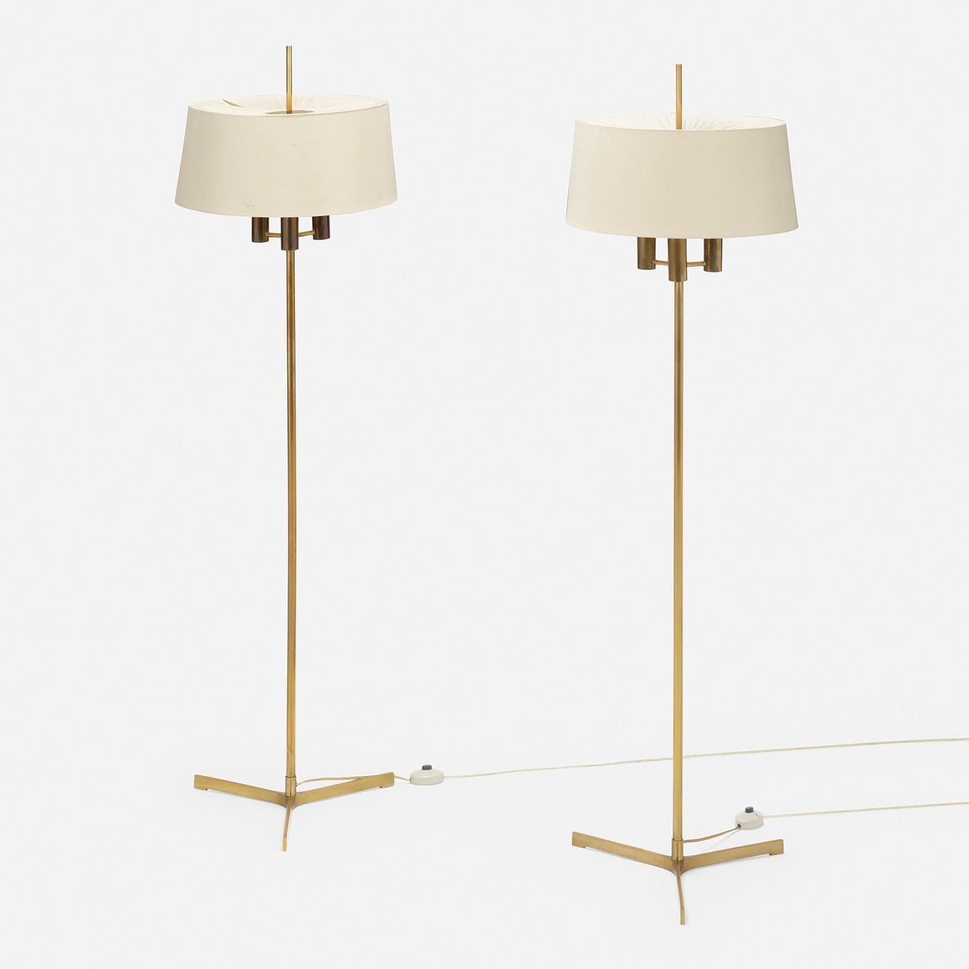Pair of Floor Lamps by Svend Aage Holm Sørensen, circa 1950

Made by Holm Sørensen & Co., Denmark, c. 1950

Additional information:
Material: Brass, linen shades
Size: 17 Dia × 60 H Inches

Condition: Overall good, to very good condition. Wired for