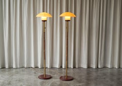 Pair of Floor Lamps in Bamboo, Patinated Brass and Yellow Glass 1940s