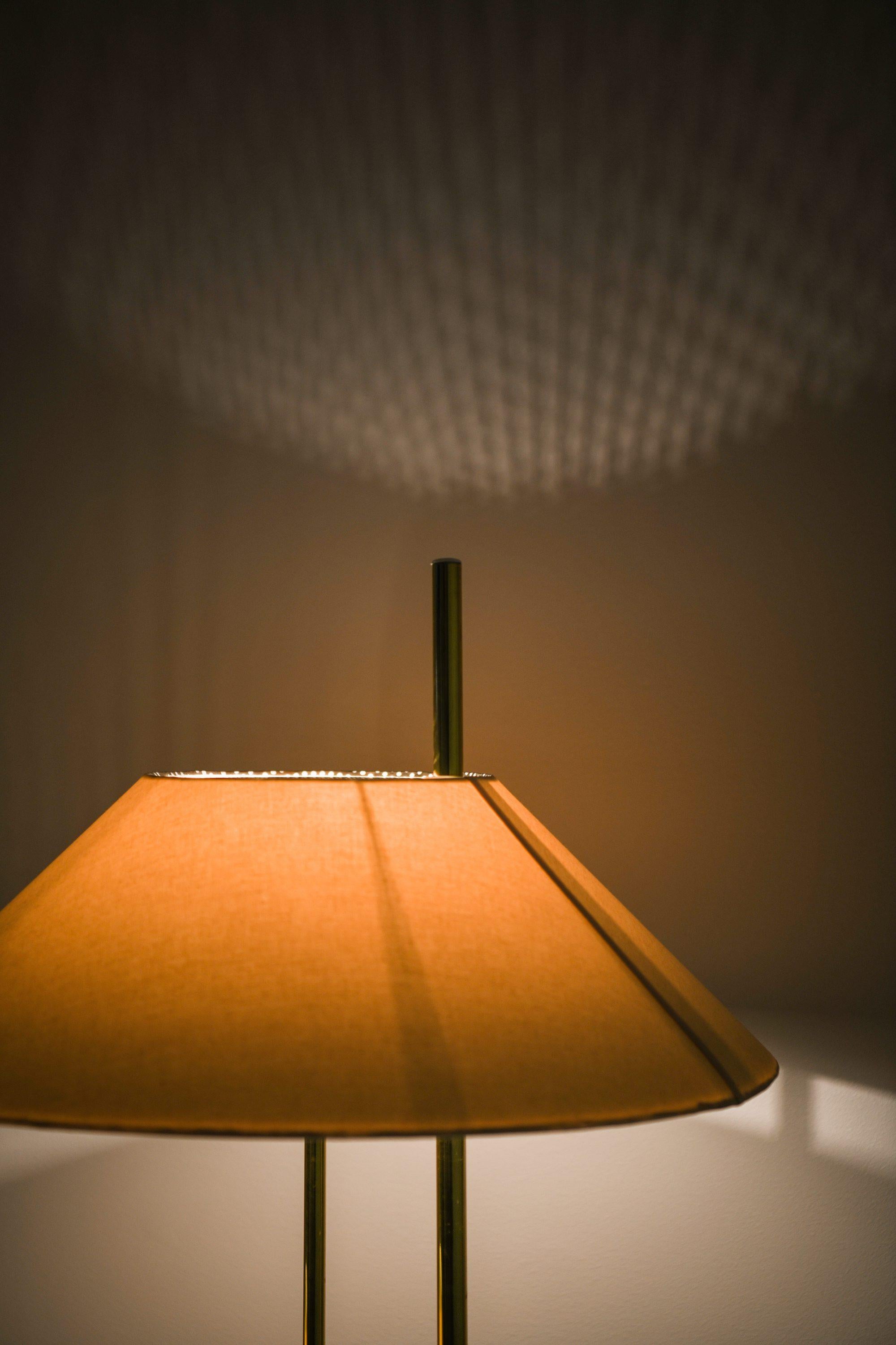 Pair of Floor Lamps in Brass and Original Lamp Shades, 1970's In Good Condition For Sale In Limhamn, Skåne län