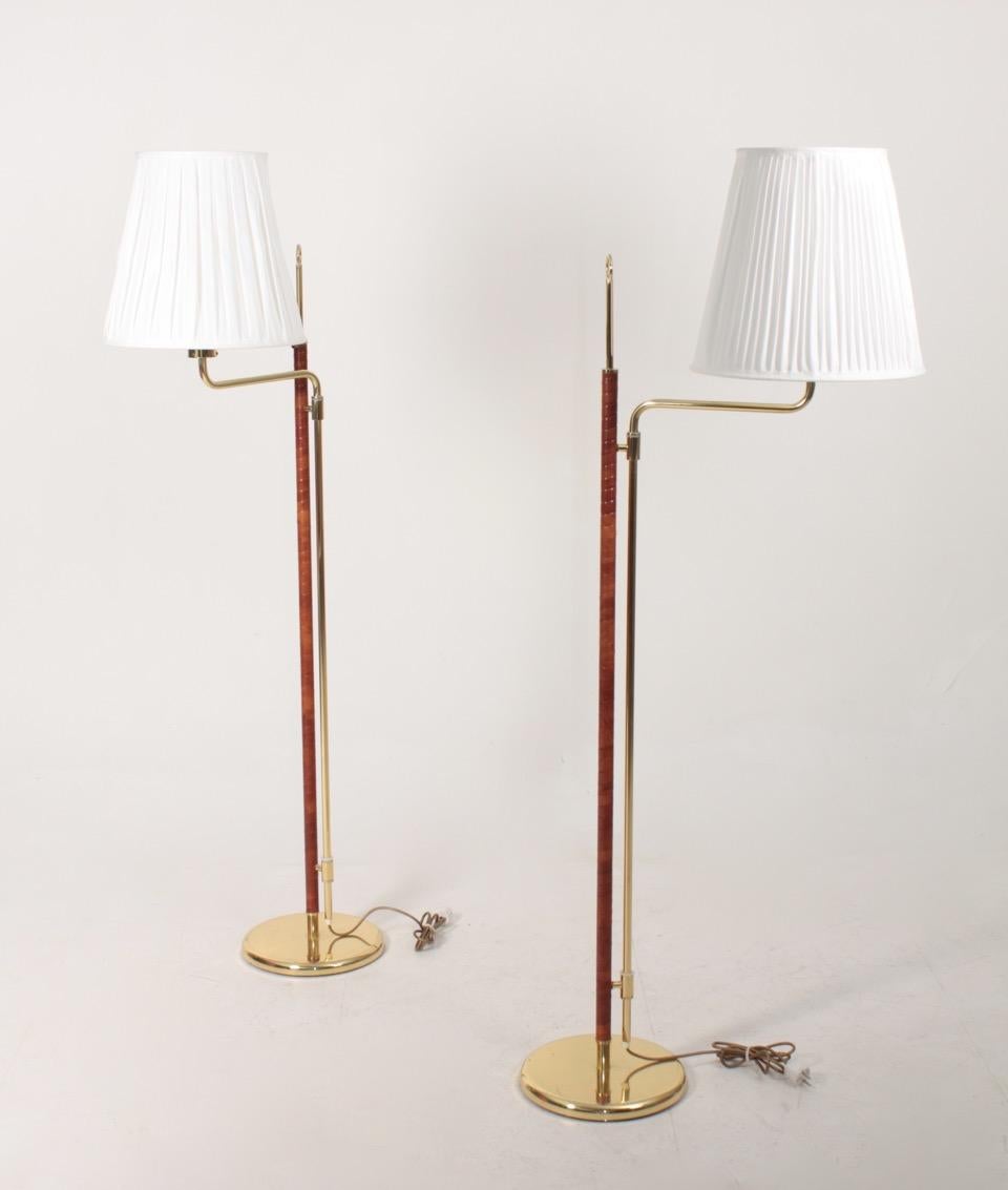 Scandinavian Modern Pair of Floor Lamps in Brass and Patinated Leather, Made in Sweden