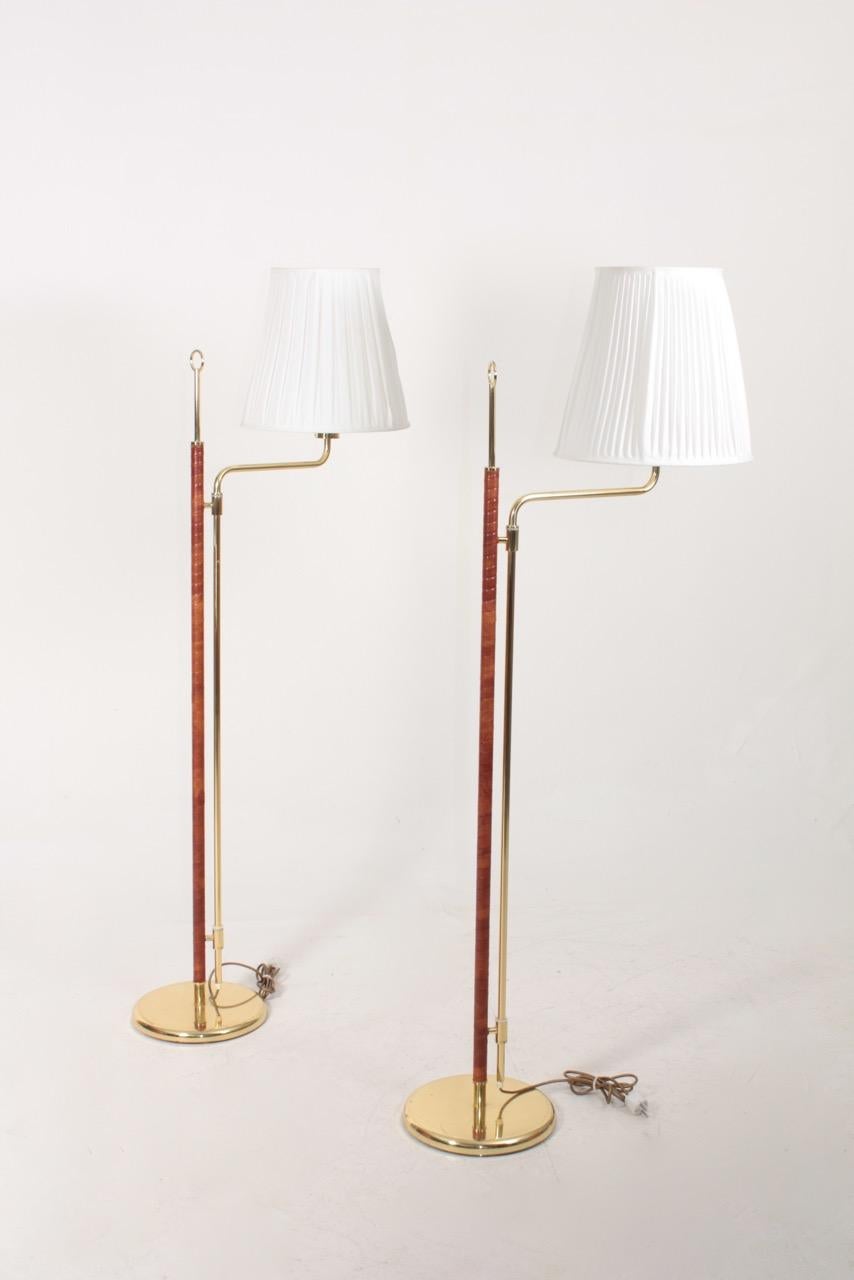 Late 20th Century Pair of Floor Lamps in Brass and Patinated Leather, Made in Sweden
