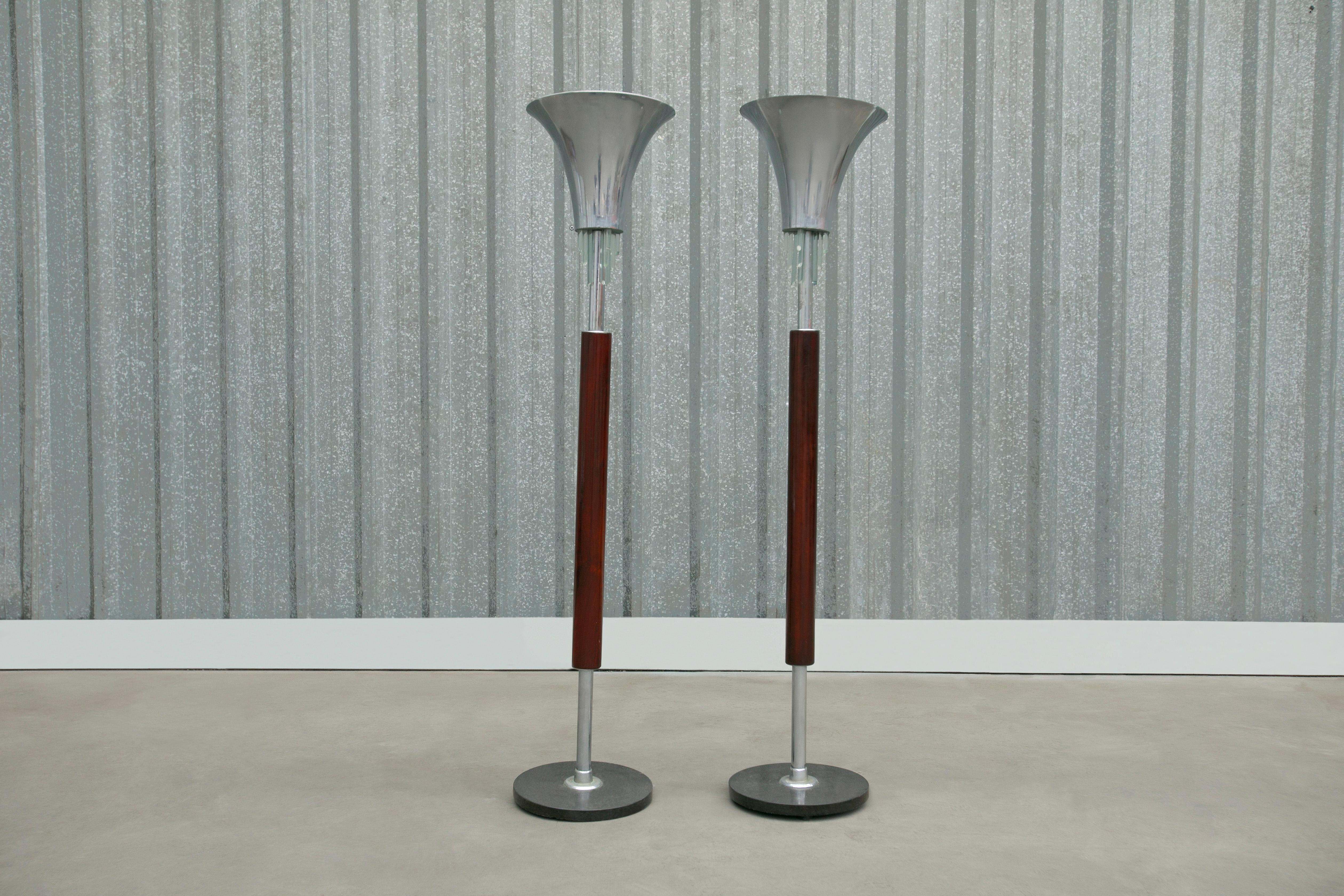 This floor lamp set is made in Brazilian rosewood, crystal and chrome. It was made in Brazil during the 1940s and is a great example of Brazilian Art Deco style featuring symmetrical, geometric and streamlined lines and the use of a tropical wood