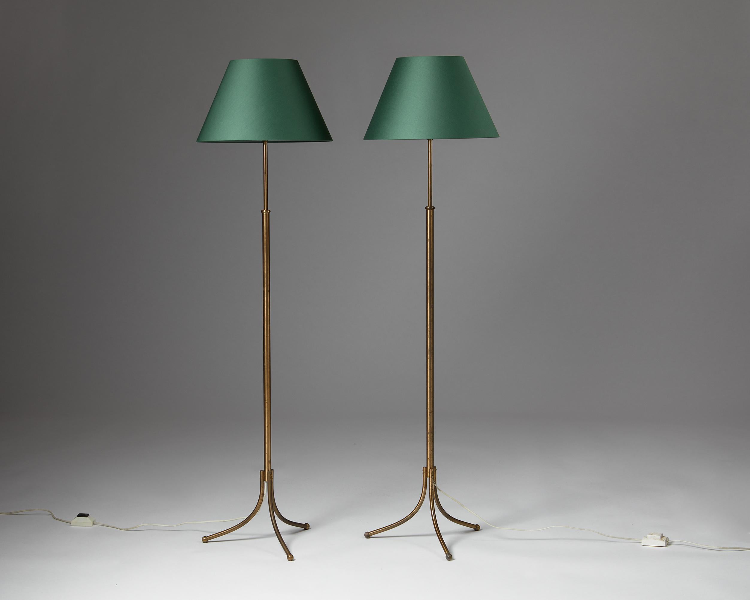 Pair of floor lamps model 2326 designed by Josef Frank for Svenskt Tenn,
Sweden. 1934.
Brass with fabric shade.

Adjustable stem height.


Measures: height: 153 cm / 5' 1/4''
Diameter: 33 cm / 13''.
 