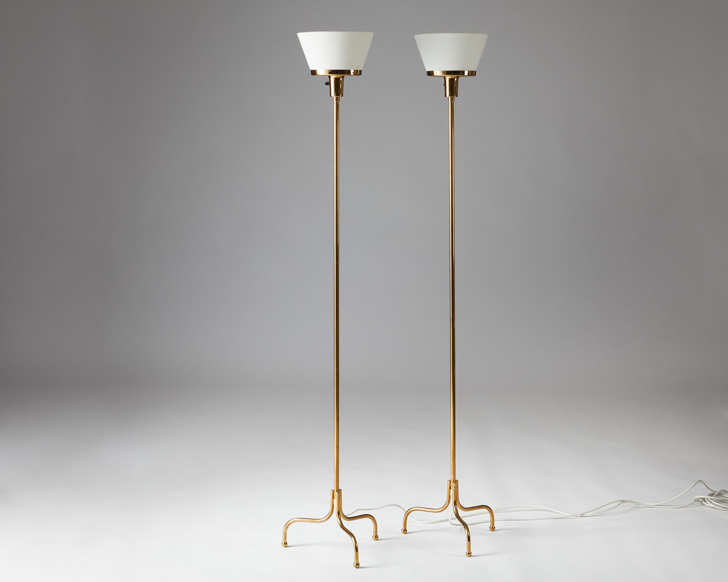 Pair of floor lamps ‘Model 2424’ designed by Josef Frank for Svenskt Tenn,
Sweden, 1930s.

Brass and silk shades.

Early model.

H: 162 cm
W: 33 cm

Josef Frank was a true European, he was also a pioneer of what would become classic 20th century