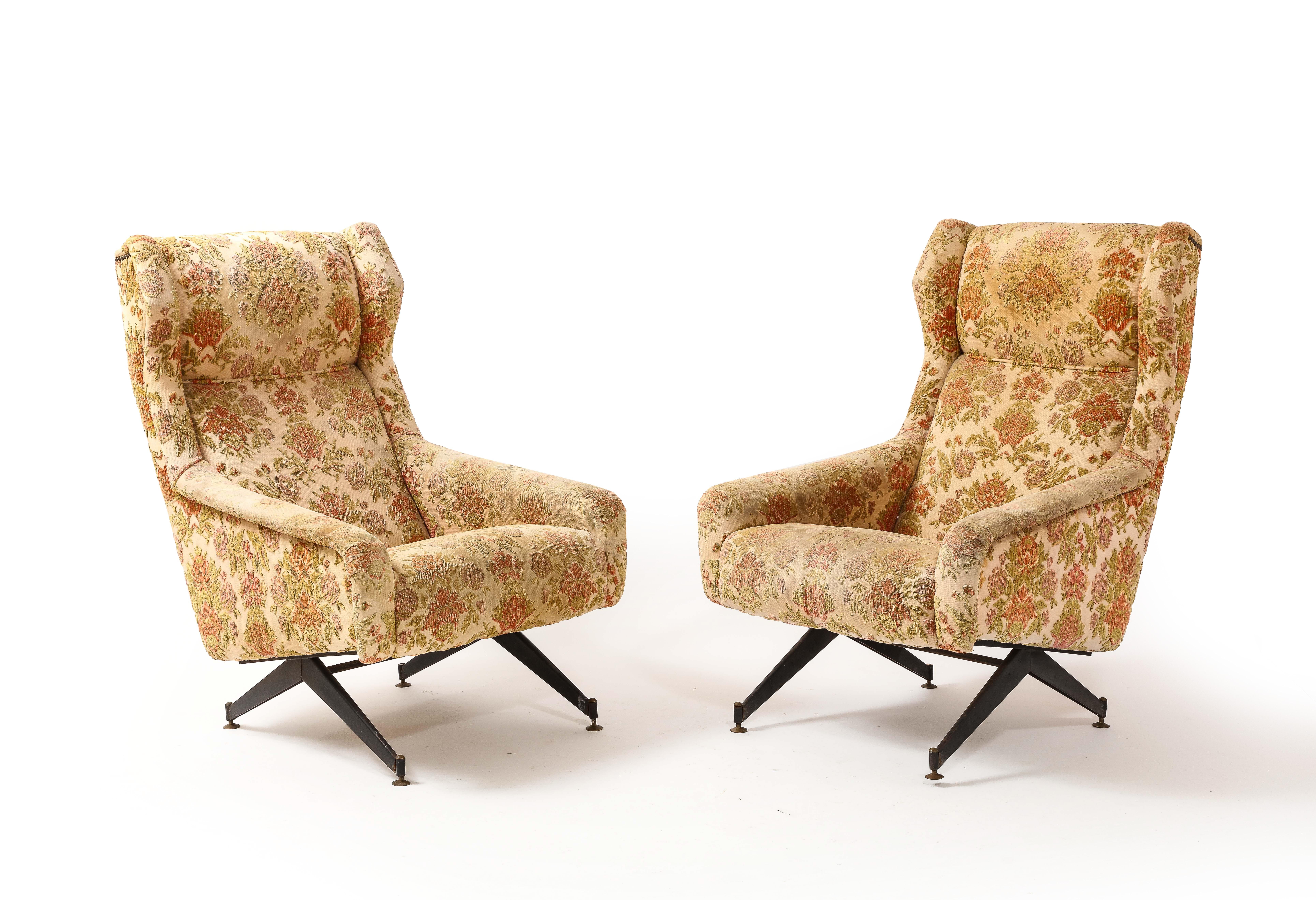 Pair of armchairs on folded metal bases with brass feet. 
COM available.
