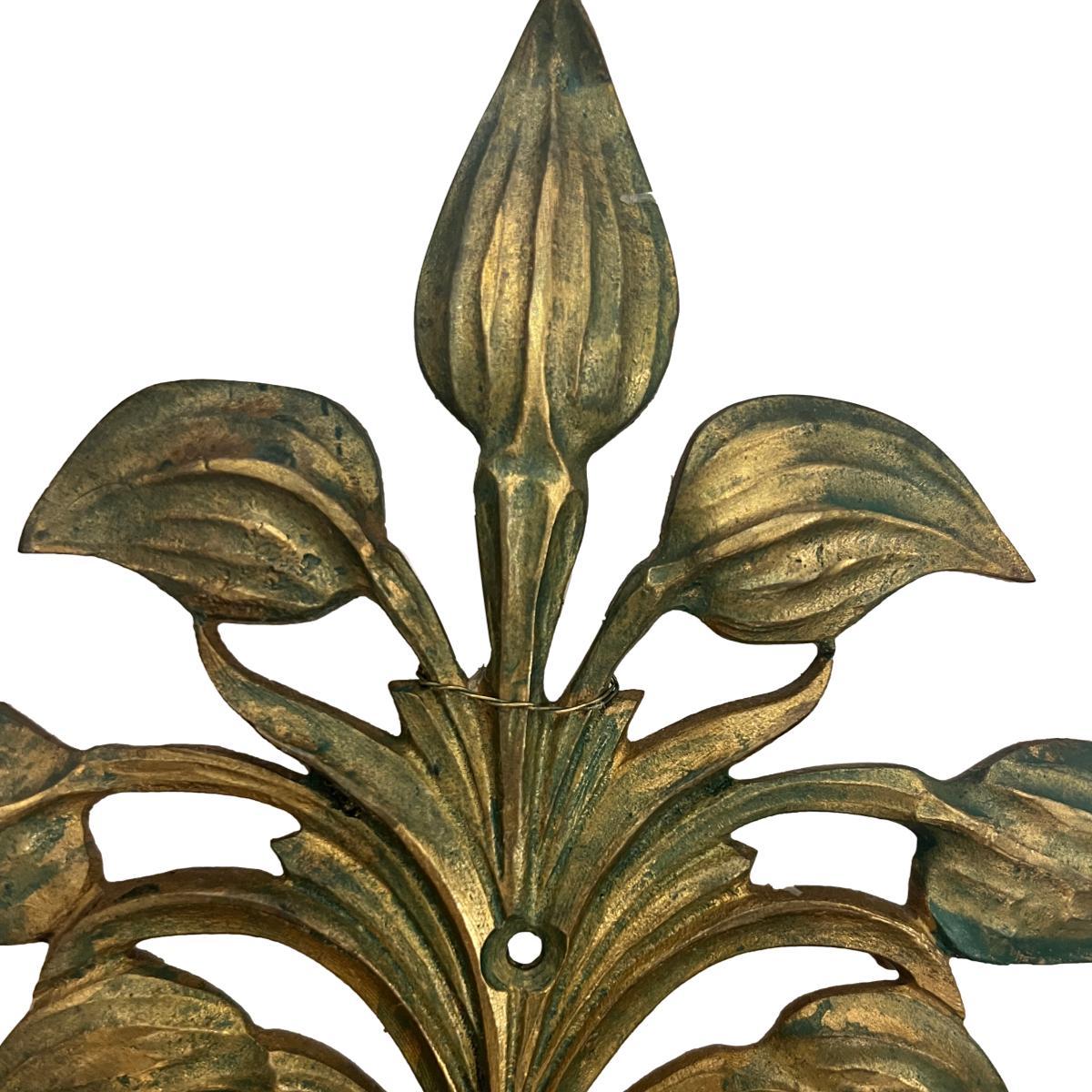 Pair of circa 1920's French gilt bronze sconces with 3 lights.

Measurements:
Height: 17