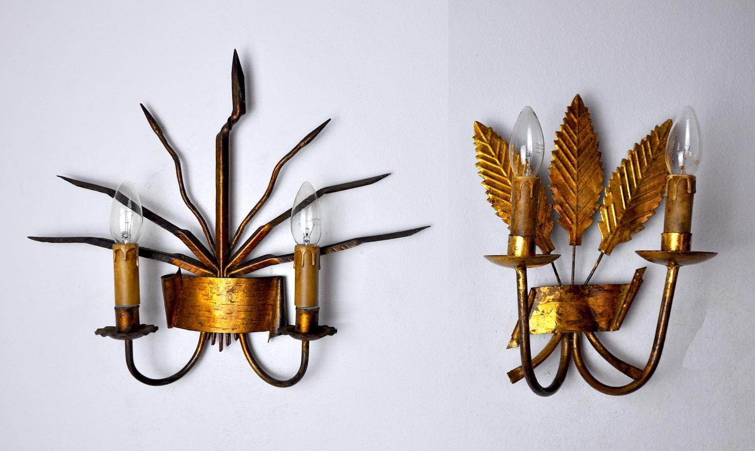Very nice pair of floral sconces. Designated and produced by ferroarte in spain in the 70s. Metal structure gilded with gold leaf. Unique object that will illuminate wonderfully and bring a real design touch to your interior. Updated electricity,