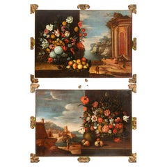 Coppia di nature morte floreali con paesaggi idealizzati, scuola romana
