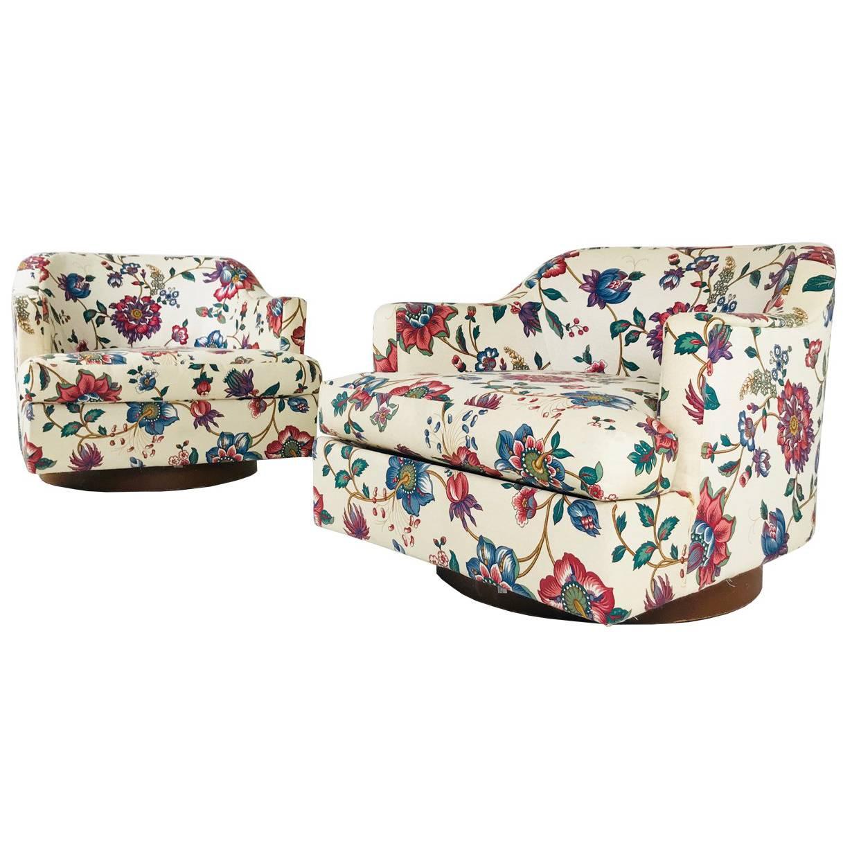 Pair of Floral Swivel Chairs in the Style of Milo Baughman.