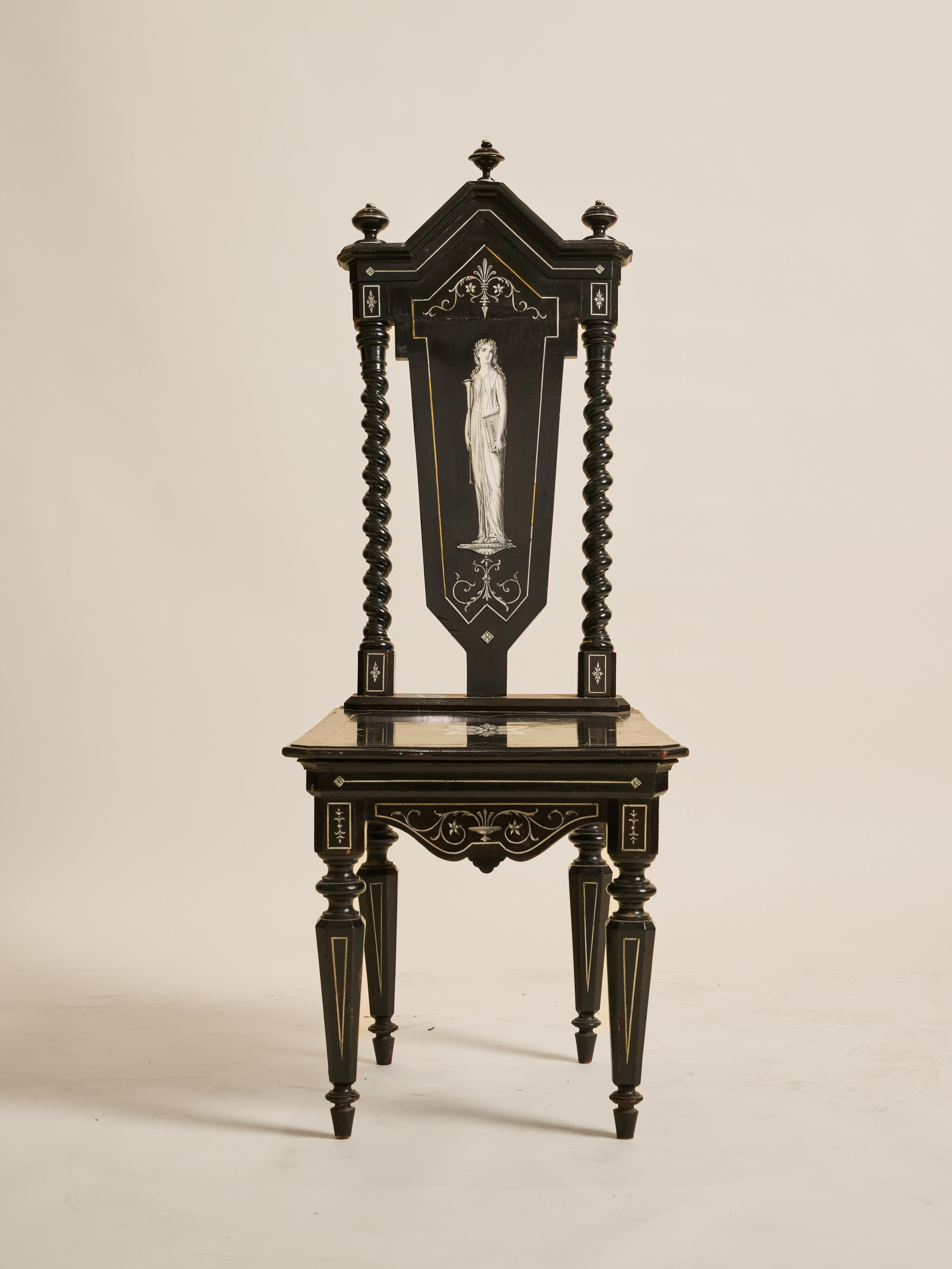 A pair of 18th-century Florentine Baroque-style side chairs, ebonized and finely inlaid with ivory. Each features a pierced splat depicting classical Greek muse, with carved details and shaped stretchers. Elegant examples of Italian craftsmanship