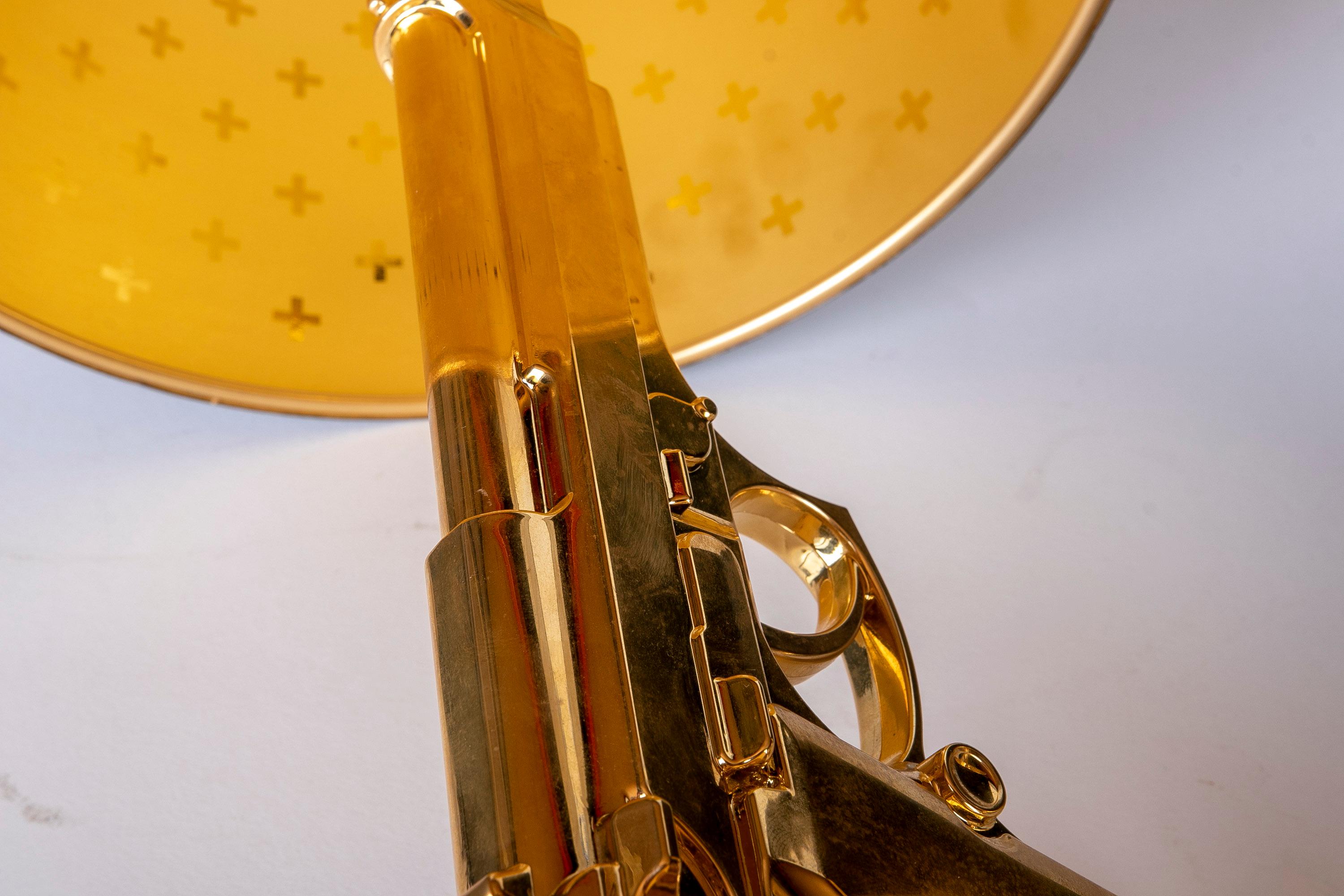 Paire de lampes de table de la collection FLOS Guns en or de Philippe Starck en vente 6