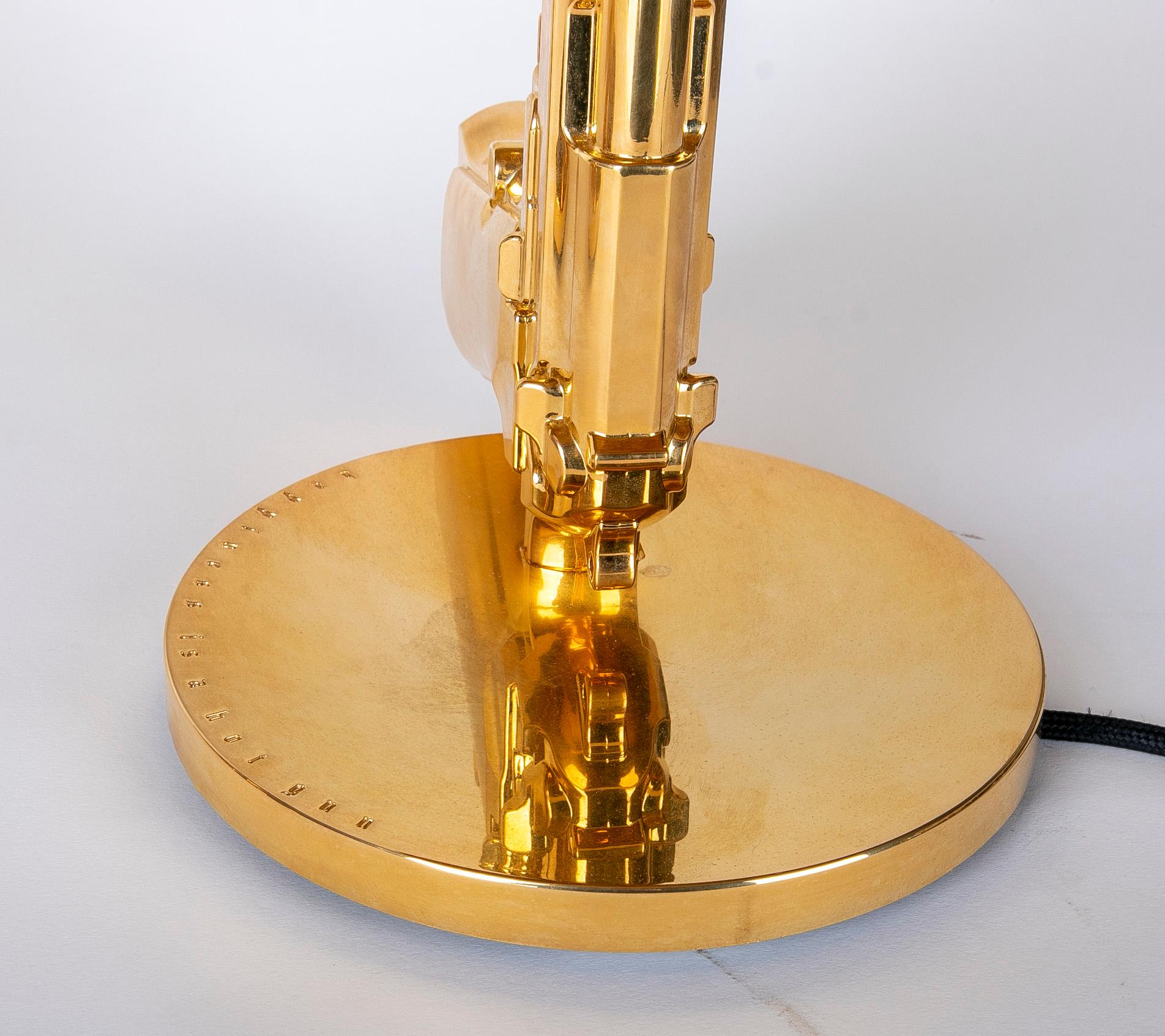 Paire de lampes de table de la collection FLOS Guns en or de Philippe Starck en vente 11