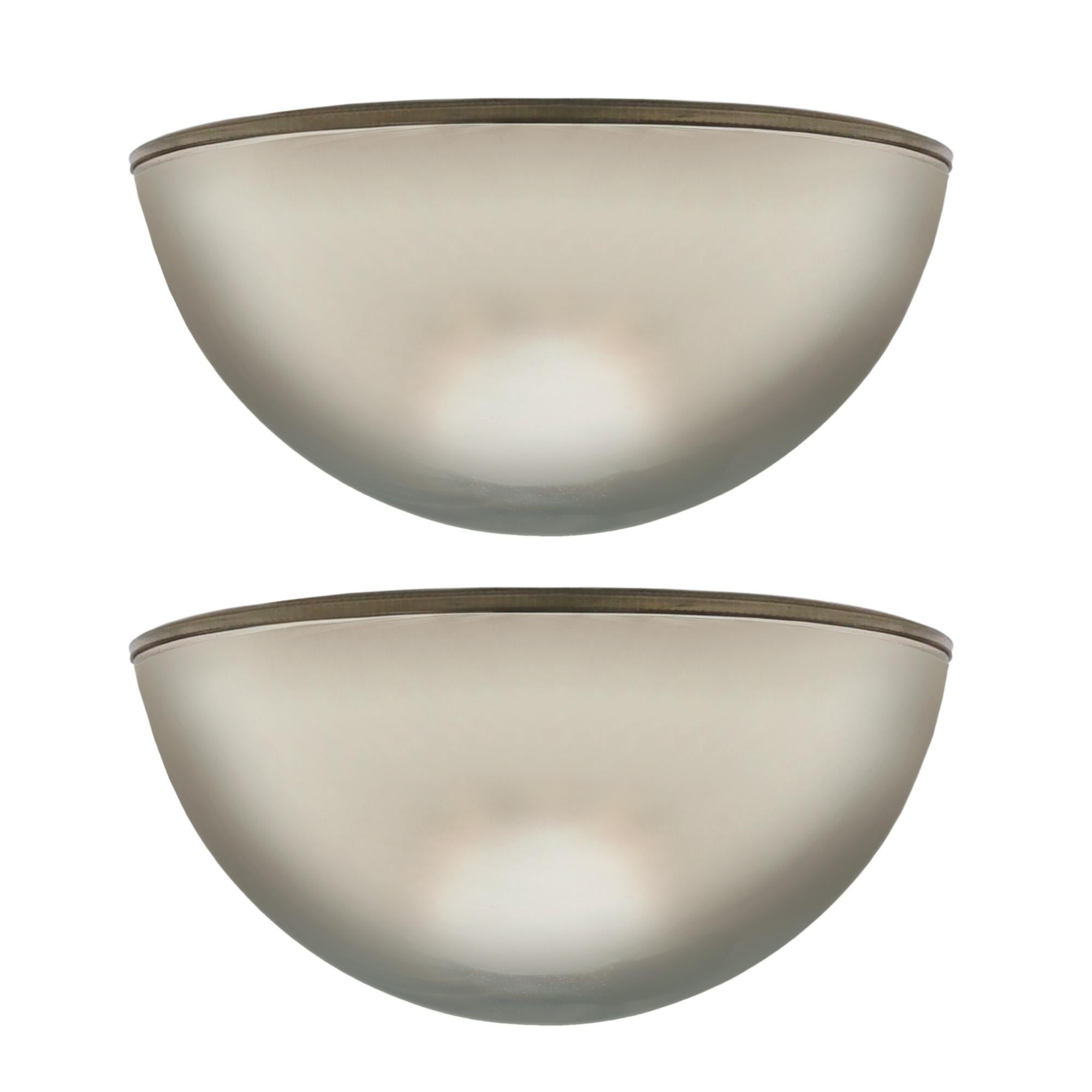 These attractive 'Quarto' wall lights were designed by Afra E Tobia Scarpa for Flos in the 1970s. 

We are selling these lights in pairs, or as a set of eight. Please ask if you have any questions. 

Made from soft, mirror like chromed metal and