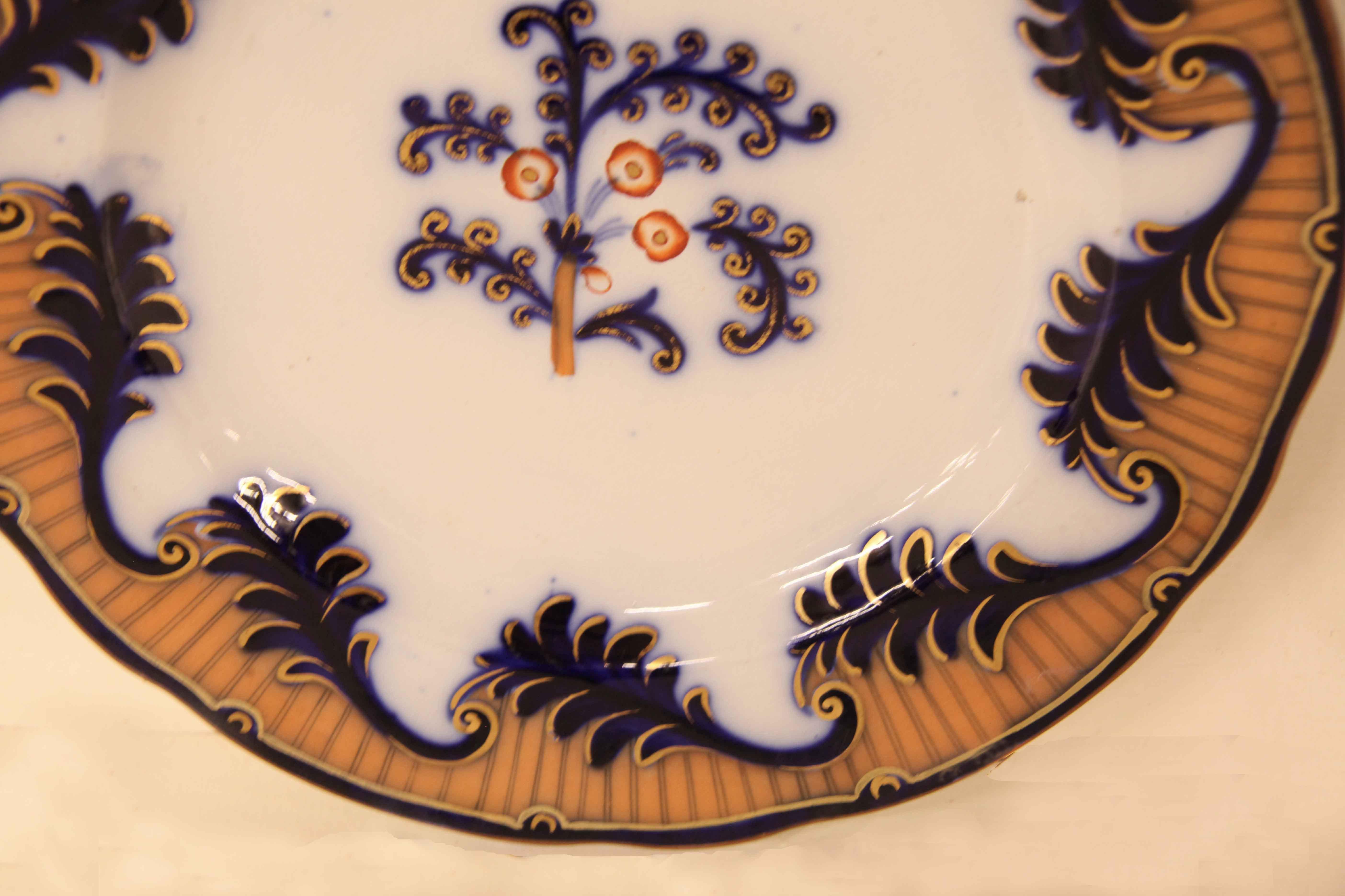 Gilt Pair of Flow Blue Staffordshire Plates For Sale