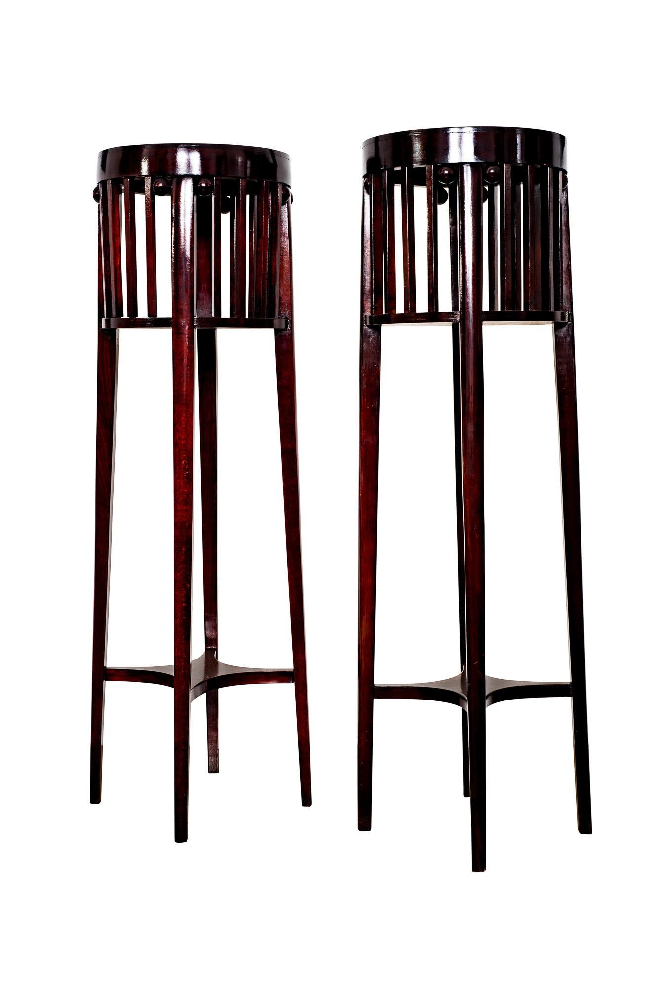 Josef Hoffmann and Gustav Siegel both worked in the atelier of Otto Wagner in the time, circa 1900. Many interior designs, that came from this workshop, show the style of those two important artists. These two flower-stands display style elements