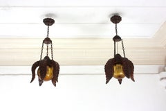 Pair of Flower Sunburst Pendants in Wood & Amber Glass, Spanish Colonial, 1940s