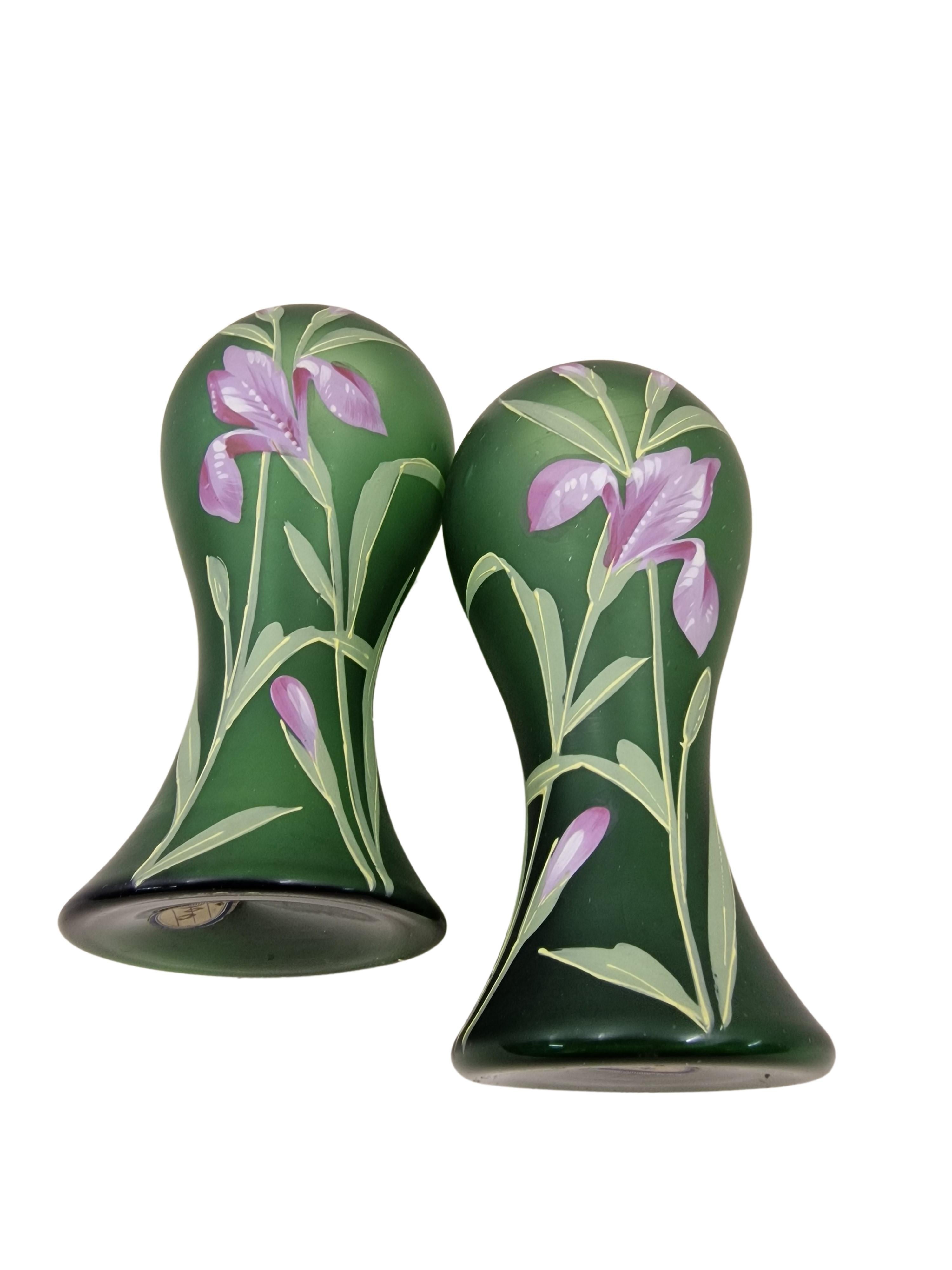 Pair of very decorative vases, from the Art Nouveau / Jugendstil era from the famous verrerie Legras, France. 
This two vases are of thick green, high quality glass. 
The vases have a round basic shape that tapers towards the top and then becomes